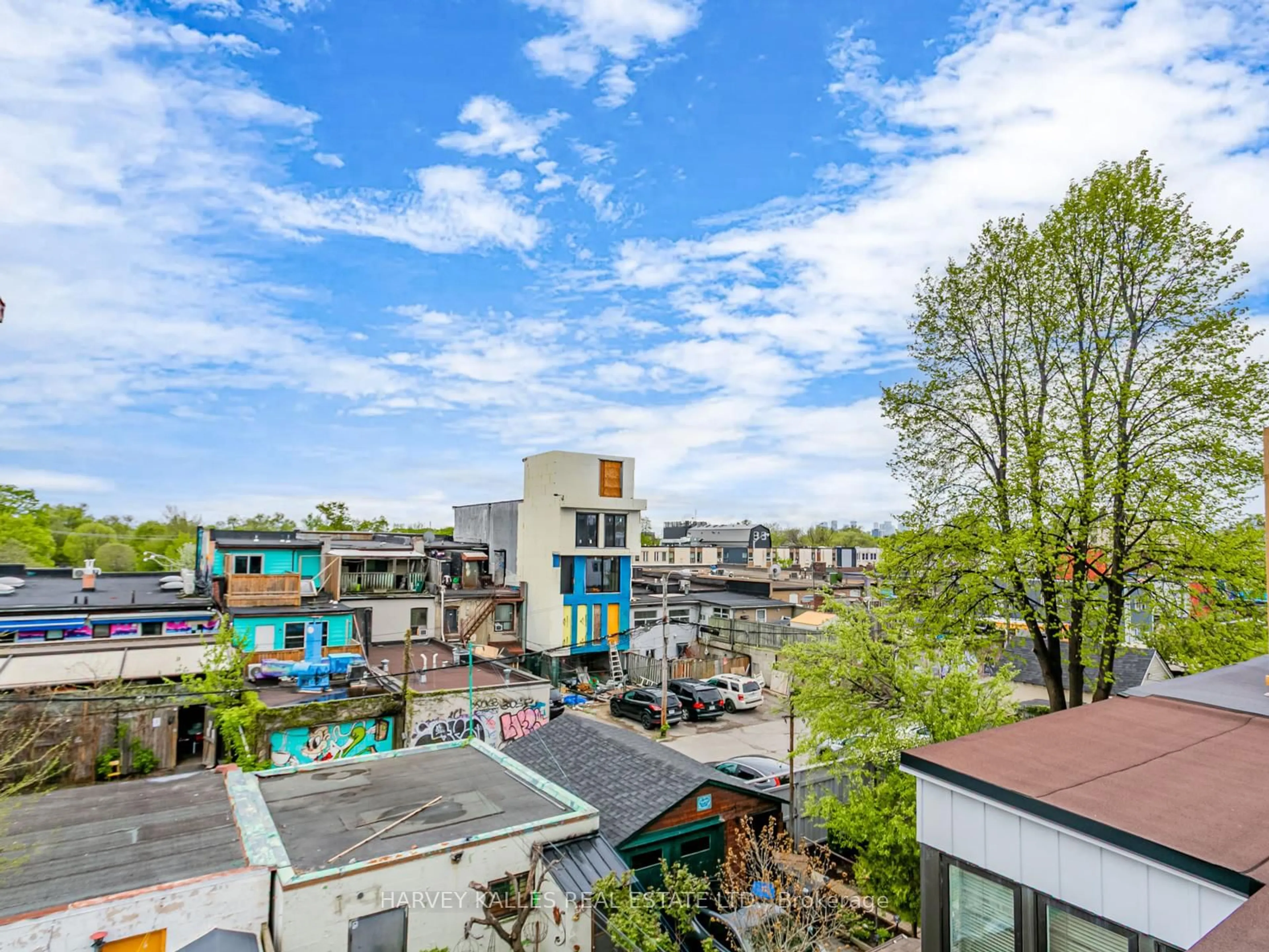 A pic from outside/outdoor area/front of a property/back of a property/a pic from drone, city buildings view from balcony for 45 Strathmore Blvd, Toronto Ontario M4C 1N5