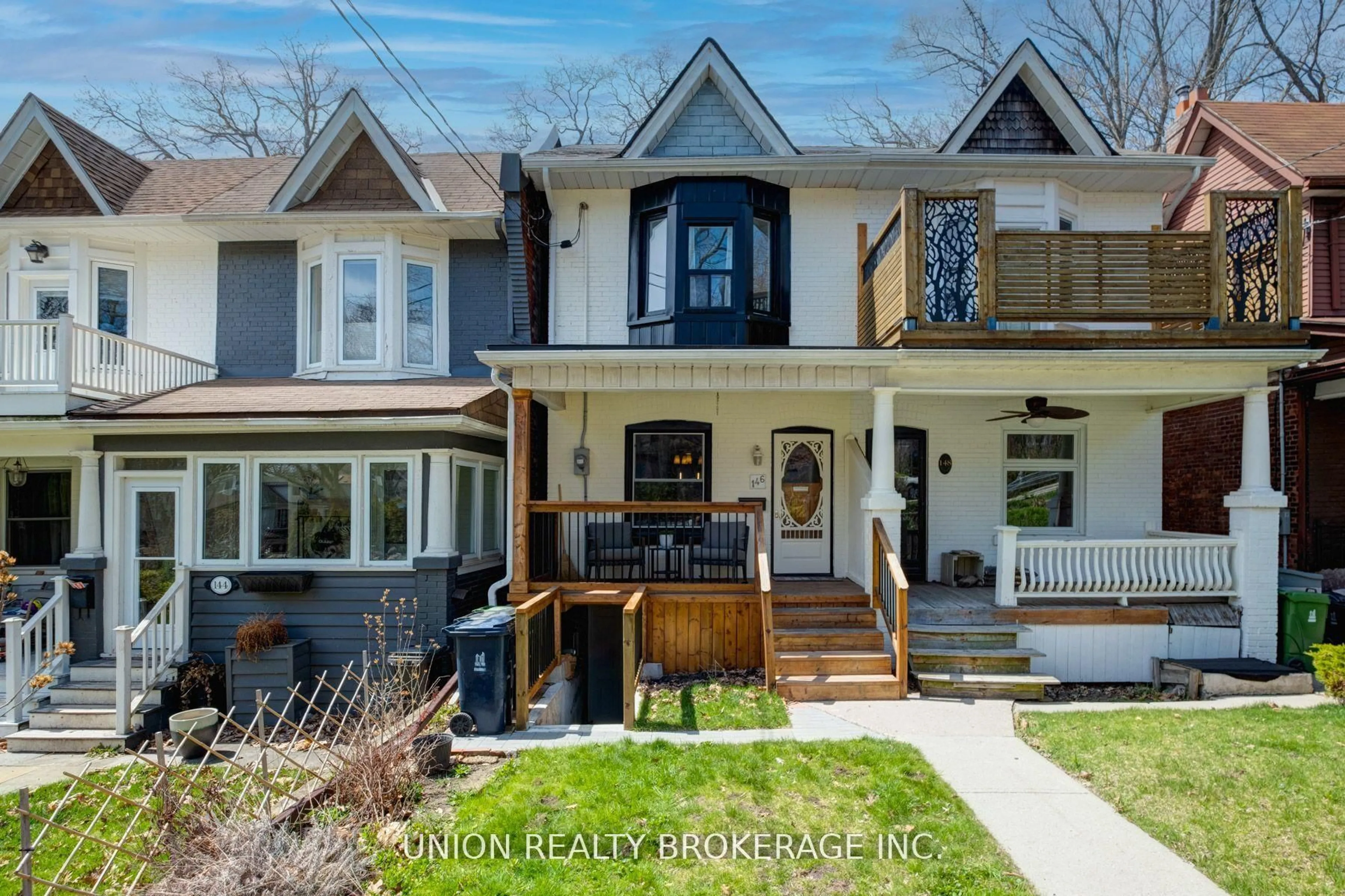 Home with brick exterior material, street for 146 Beech Ave, Toronto Ontario M4E 3H6