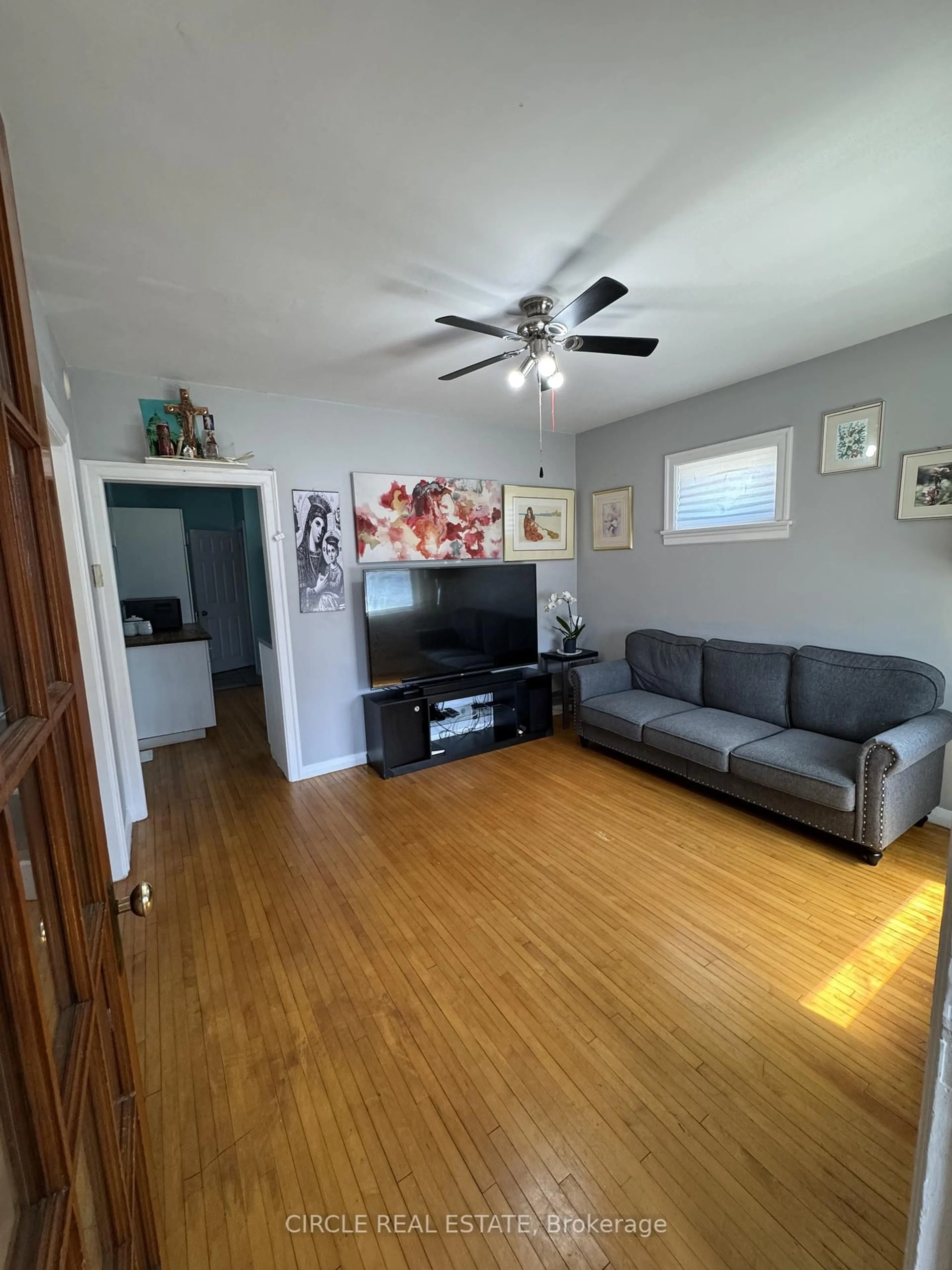 Living room with furniture, wood/laminate floor for 294 Eulalie Ave, Oshawa Ontario L1H 2B7