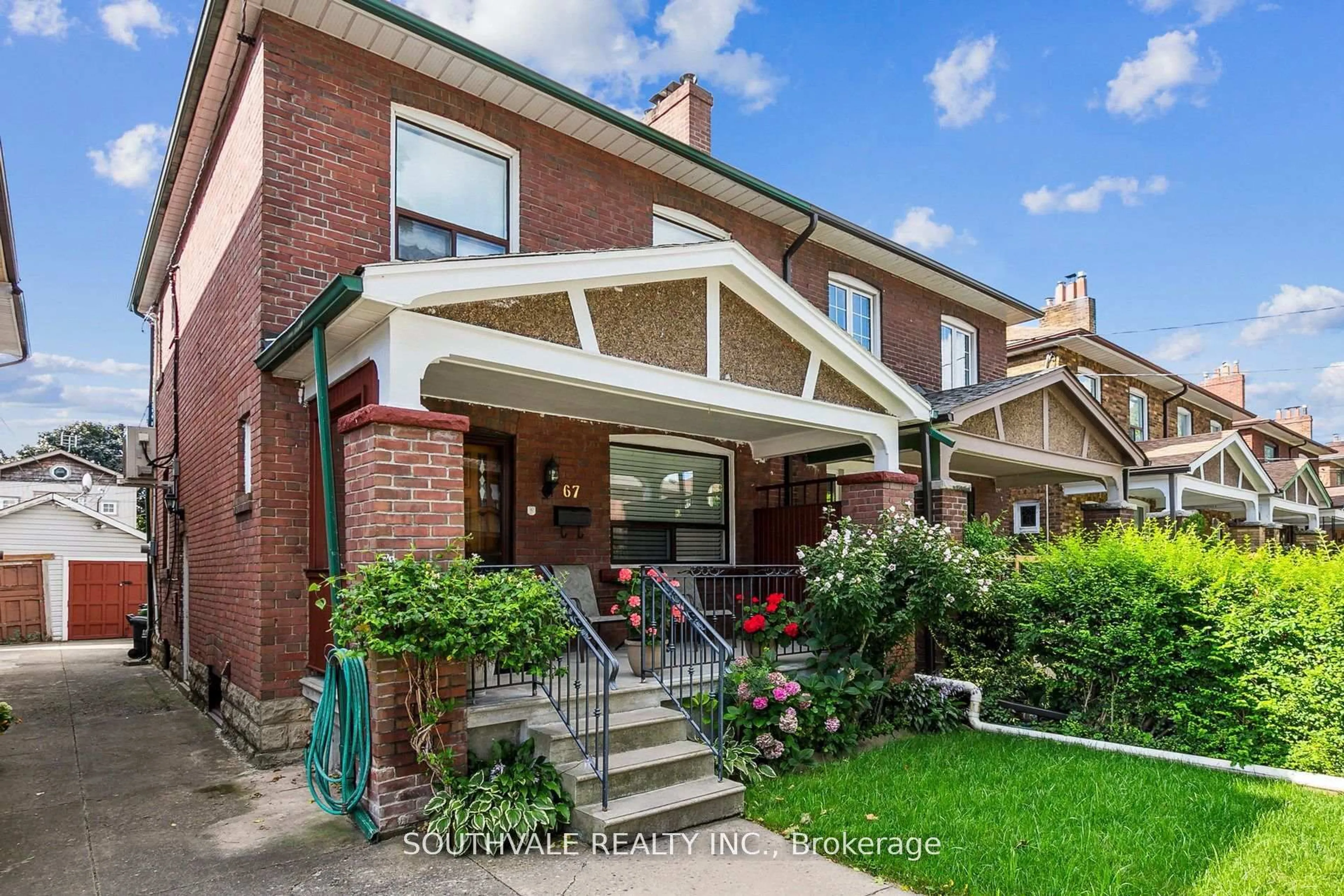 Home with brick exterior material, street for 67 Kings Park Blvd, Toronto Ontario M4J 2B9