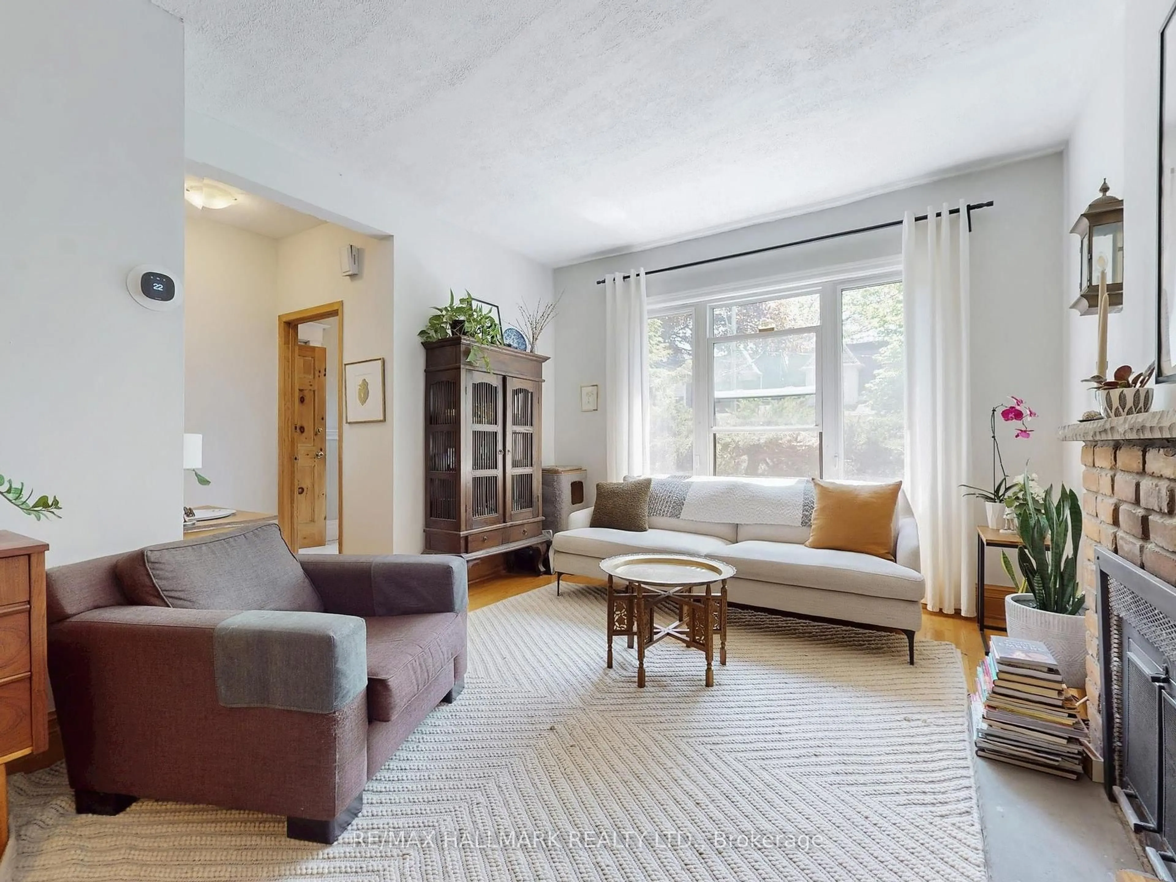 Living room with furniture, unknown for 34 Strathcona Ave, Toronto Ontario M4K 1K7