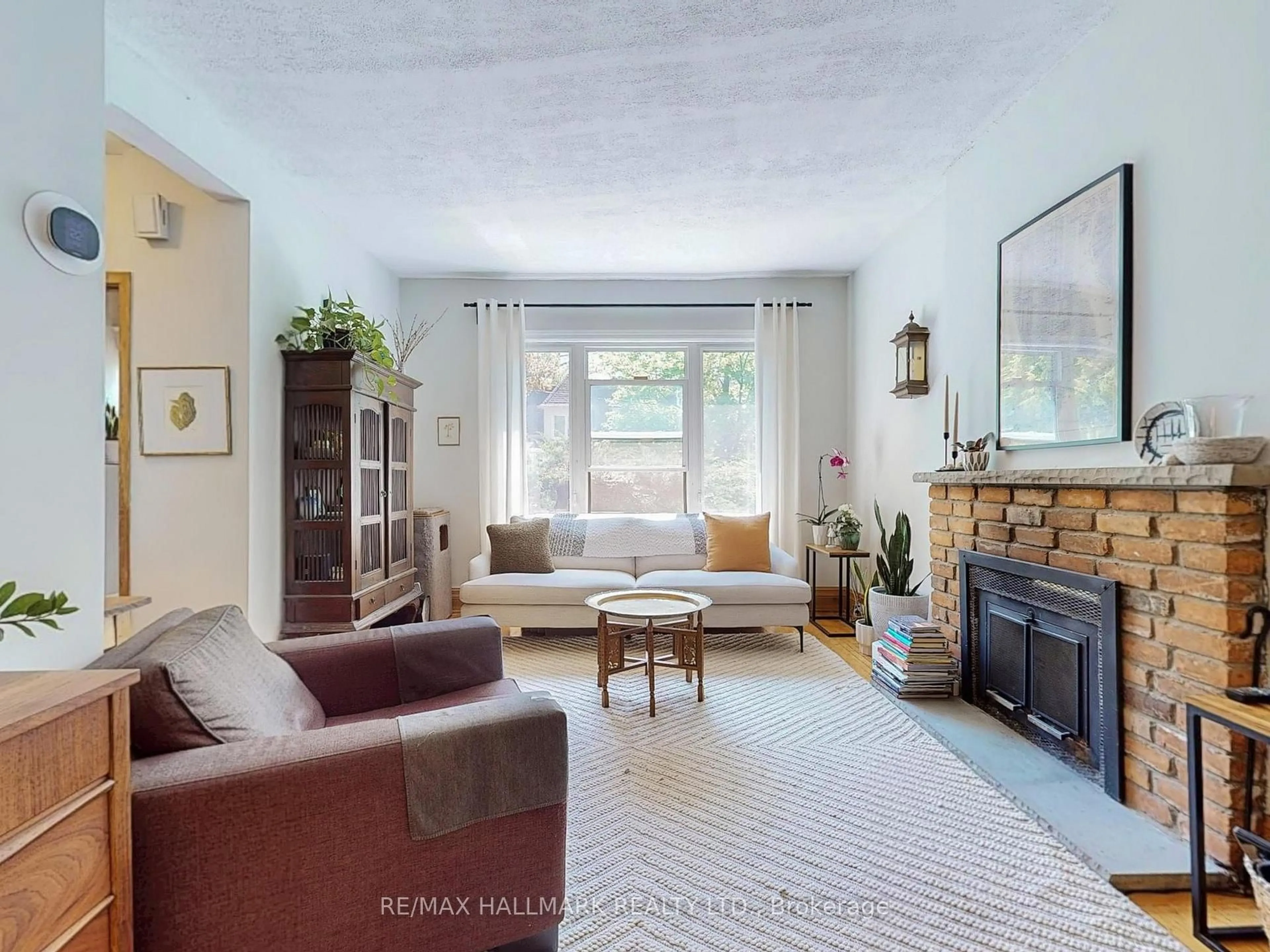 Living room with furniture, unknown for 34 Strathcona Ave, Toronto Ontario M4K 1K7