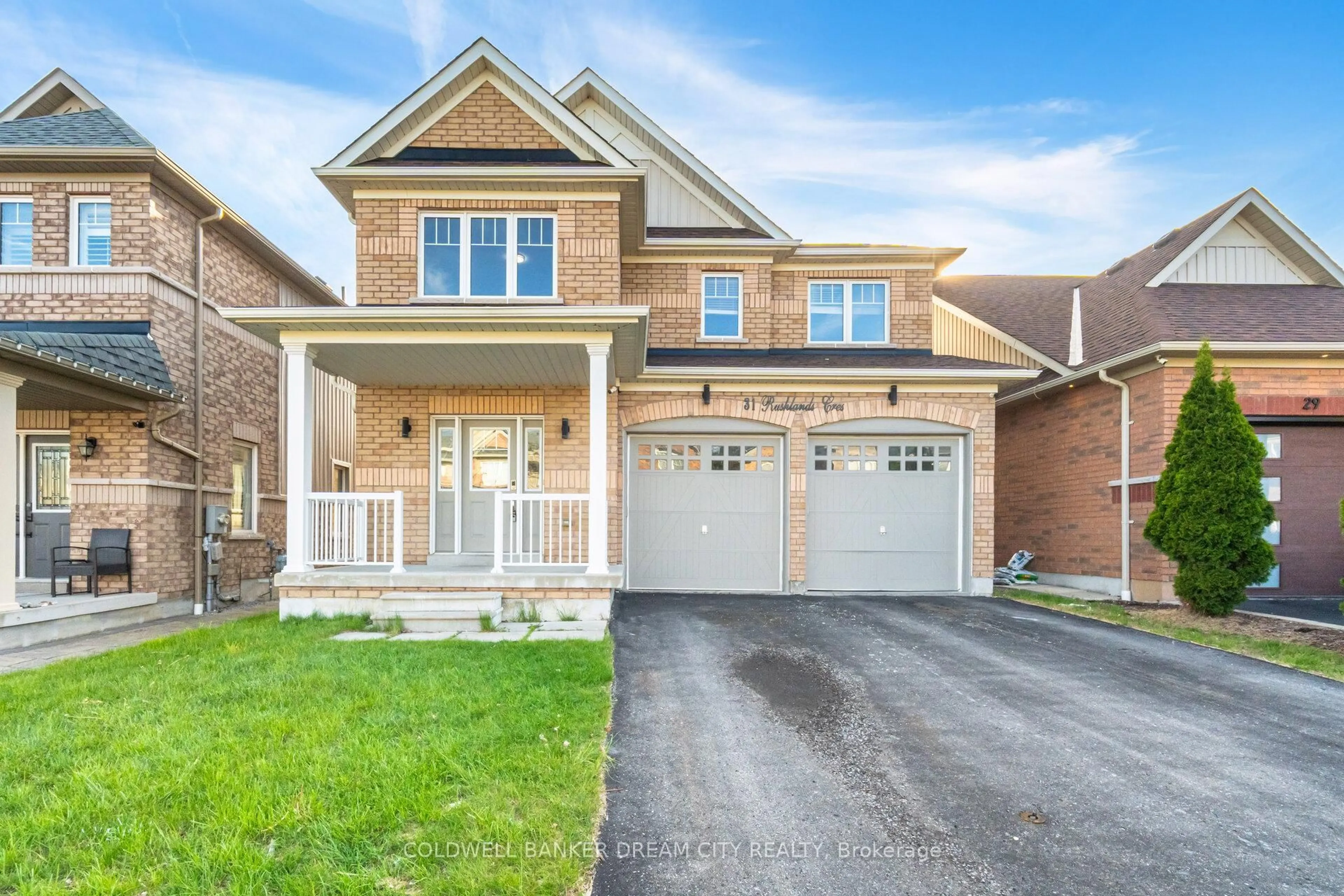Home with brick exterior material, street for 31 Rushlands Cres, Whitby Ontario L1R 0J8