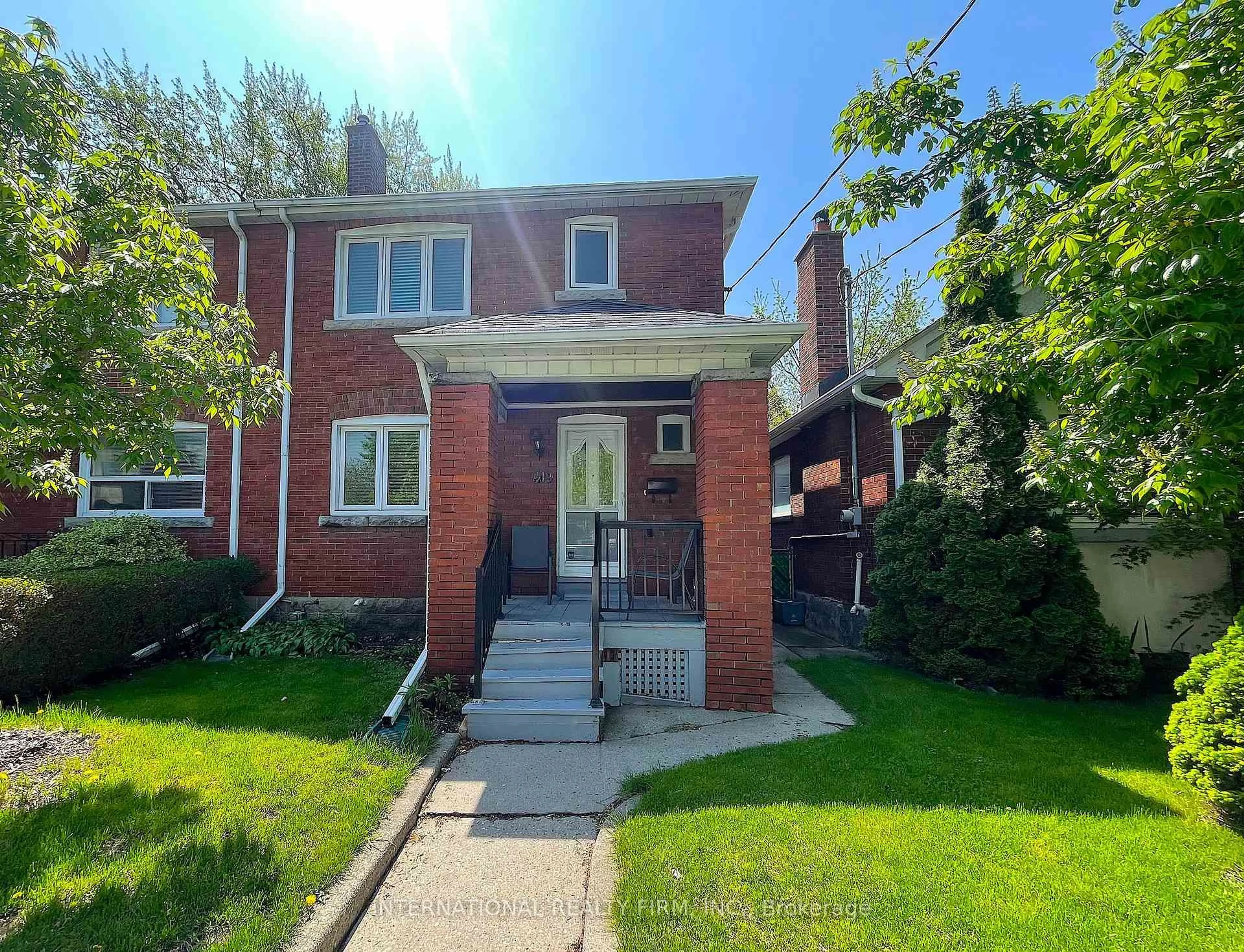 Home with brick exterior material, street for 419 Mortimer Ave, Toronto Ontario M4J 2E8