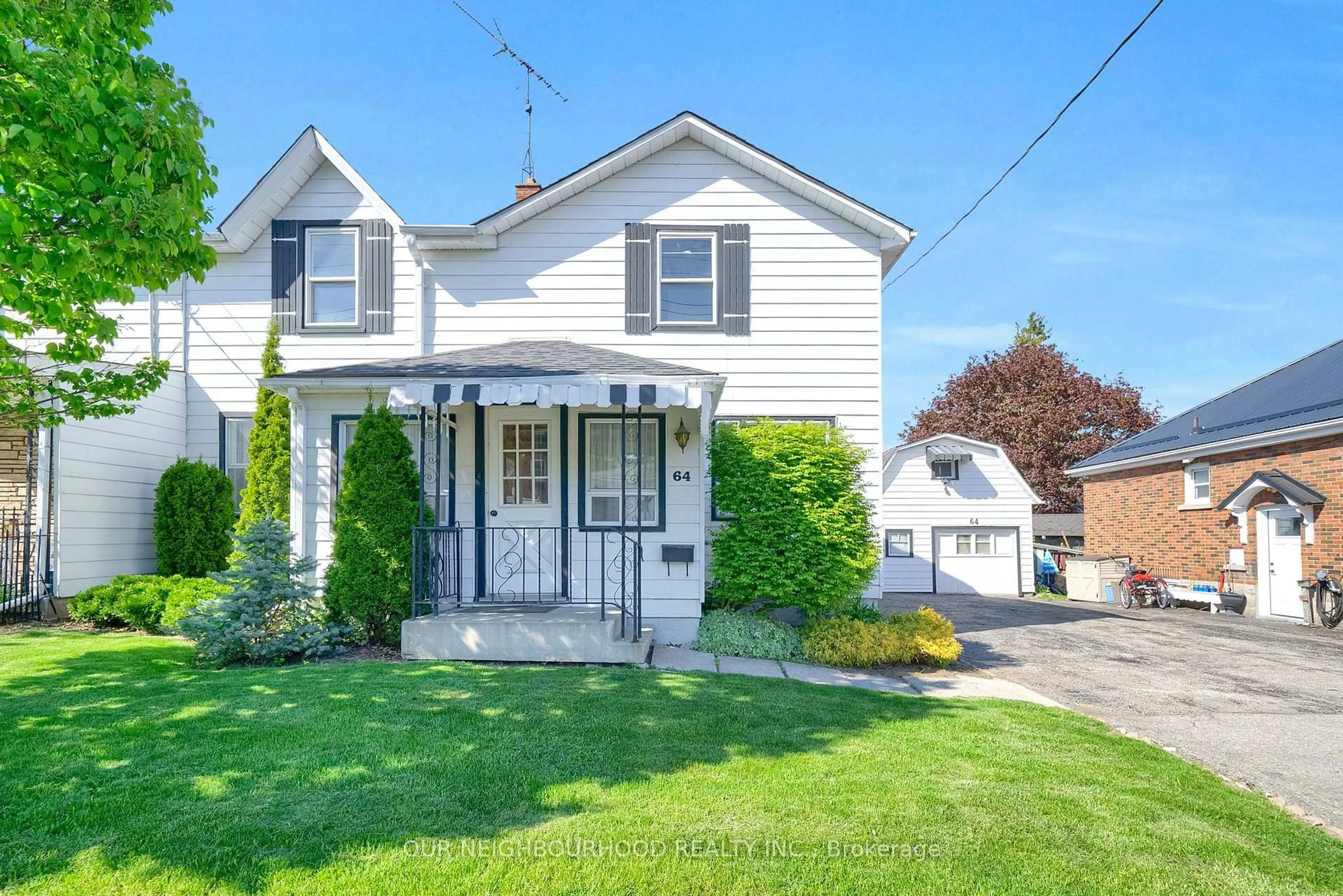 Home with vinyl exterior material, street for 64 Wellington St, Clarington Ontario L1C 1V5