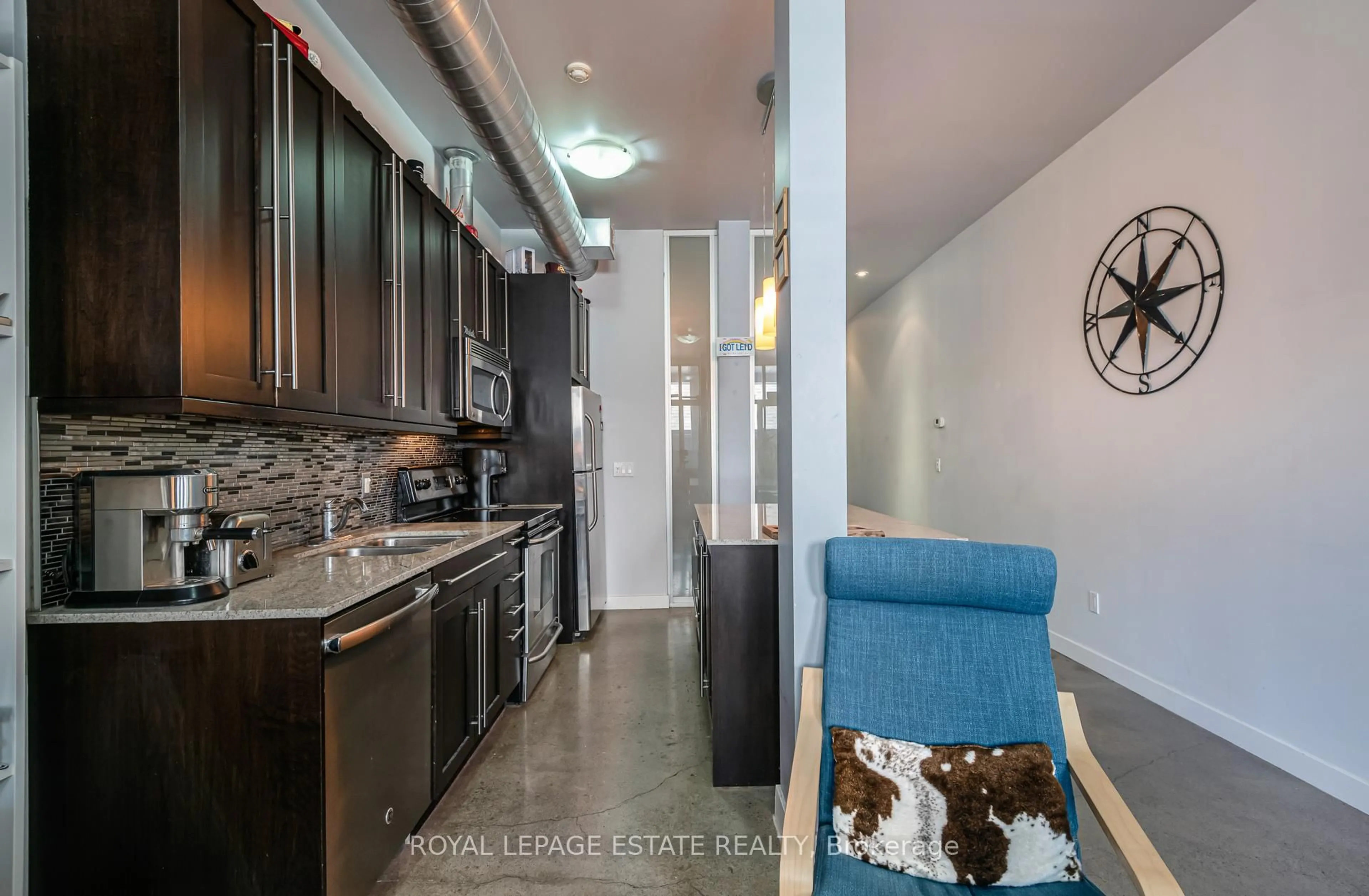 Open concept kitchen, ceramic/tile floor for 952 Kingston Rd #206, Toronto Ontario M4E 1S7