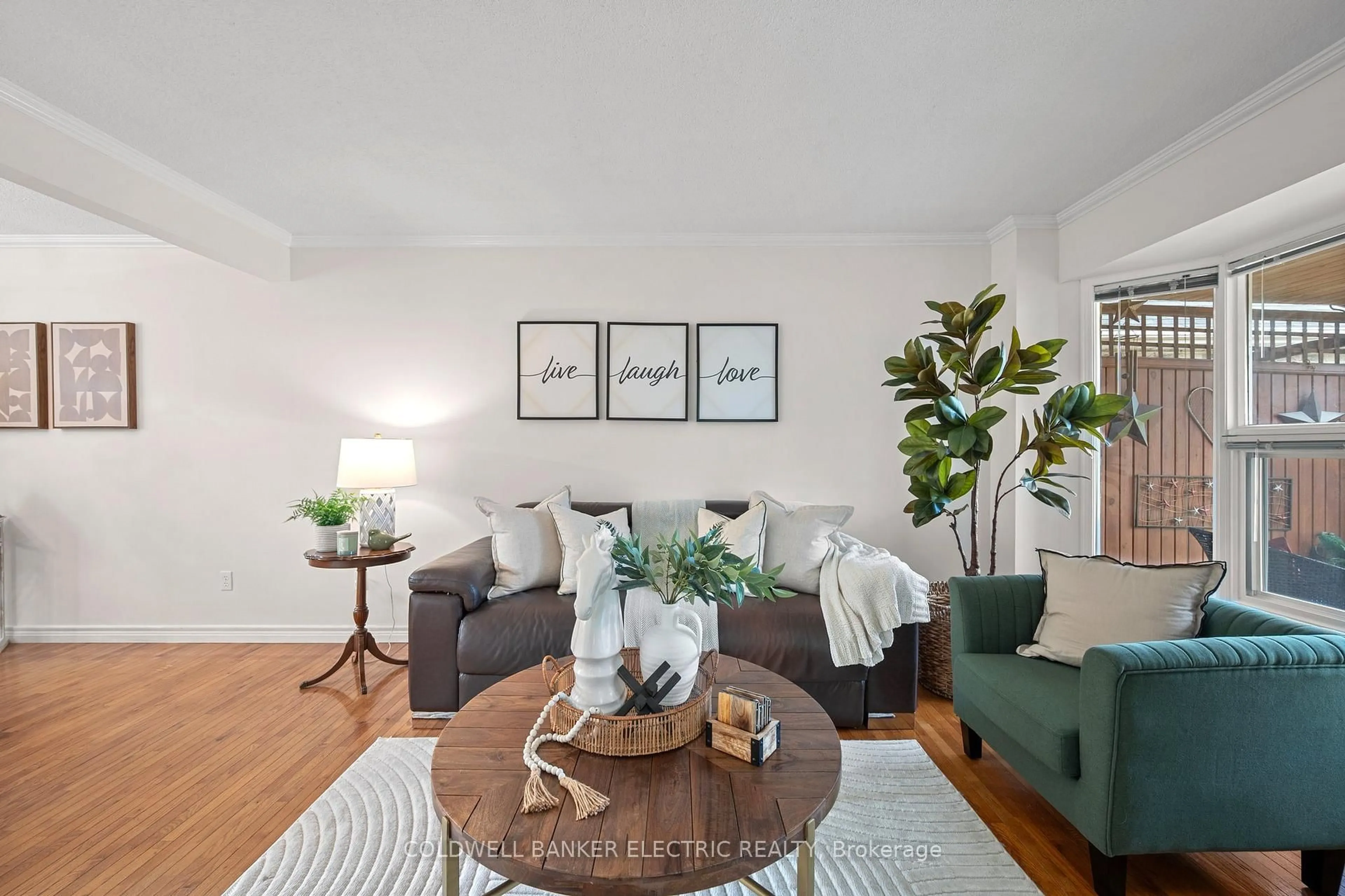 Living room with furniture, wood/laminate floor for 55 Barnes Dr, Ajax Ontario L1S 5G6