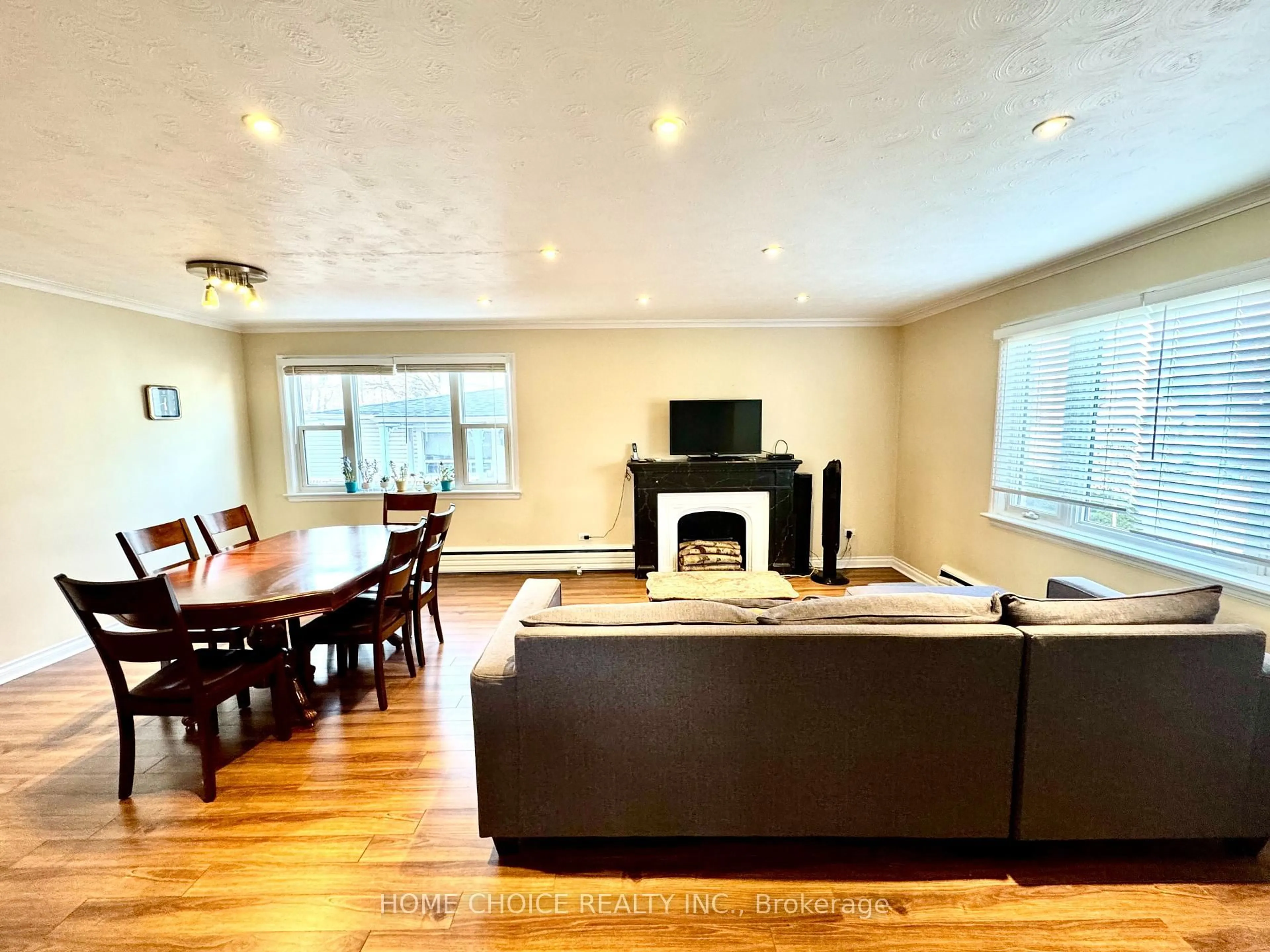 Living room with furniture, wood/laminate floor for 48 South Woodrow Blvd, Toronto Ontario M1N 3L6