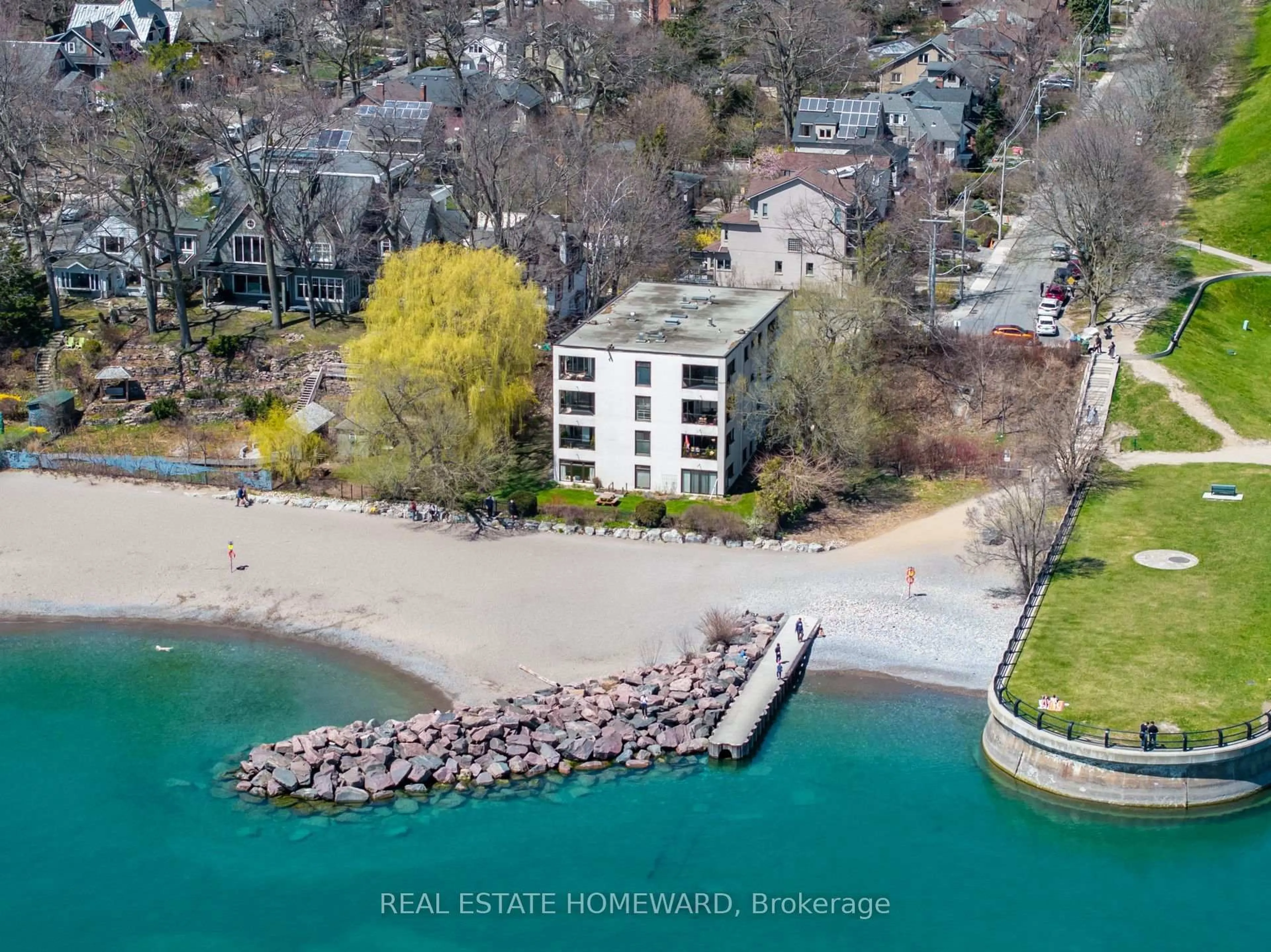 A pic from outside/outdoor area/front of a property/back of a property/a pic from drone, water/lake/river/ocean view for 2 Nursewood Rd #2, Toronto Ontario M4E 3R8