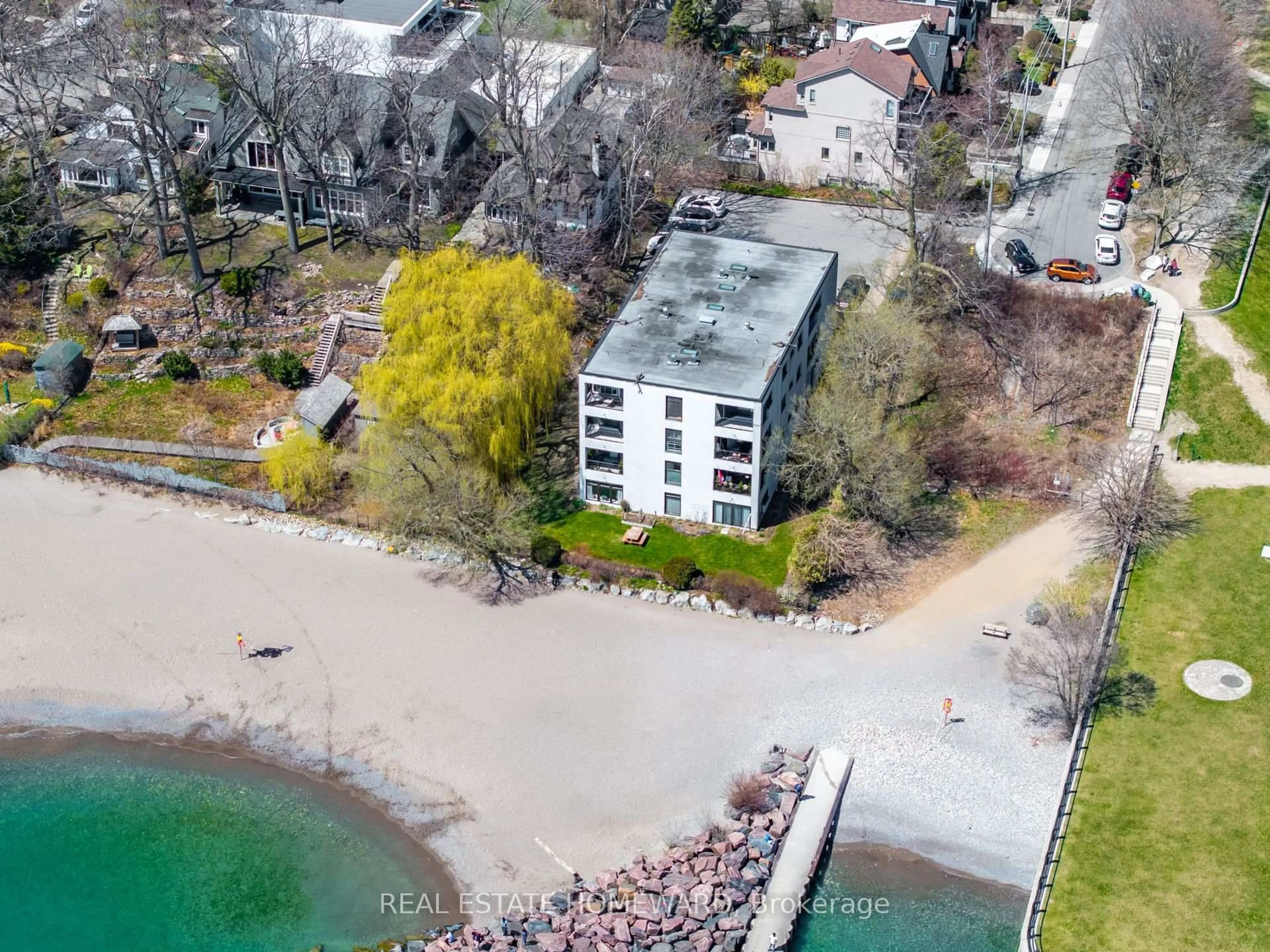 A pic from outside/outdoor area/front of a property/back of a property/a pic from drone, water/lake/river/ocean view for 2 Nursewood Rd #2, Toronto Ontario M4E 3R8