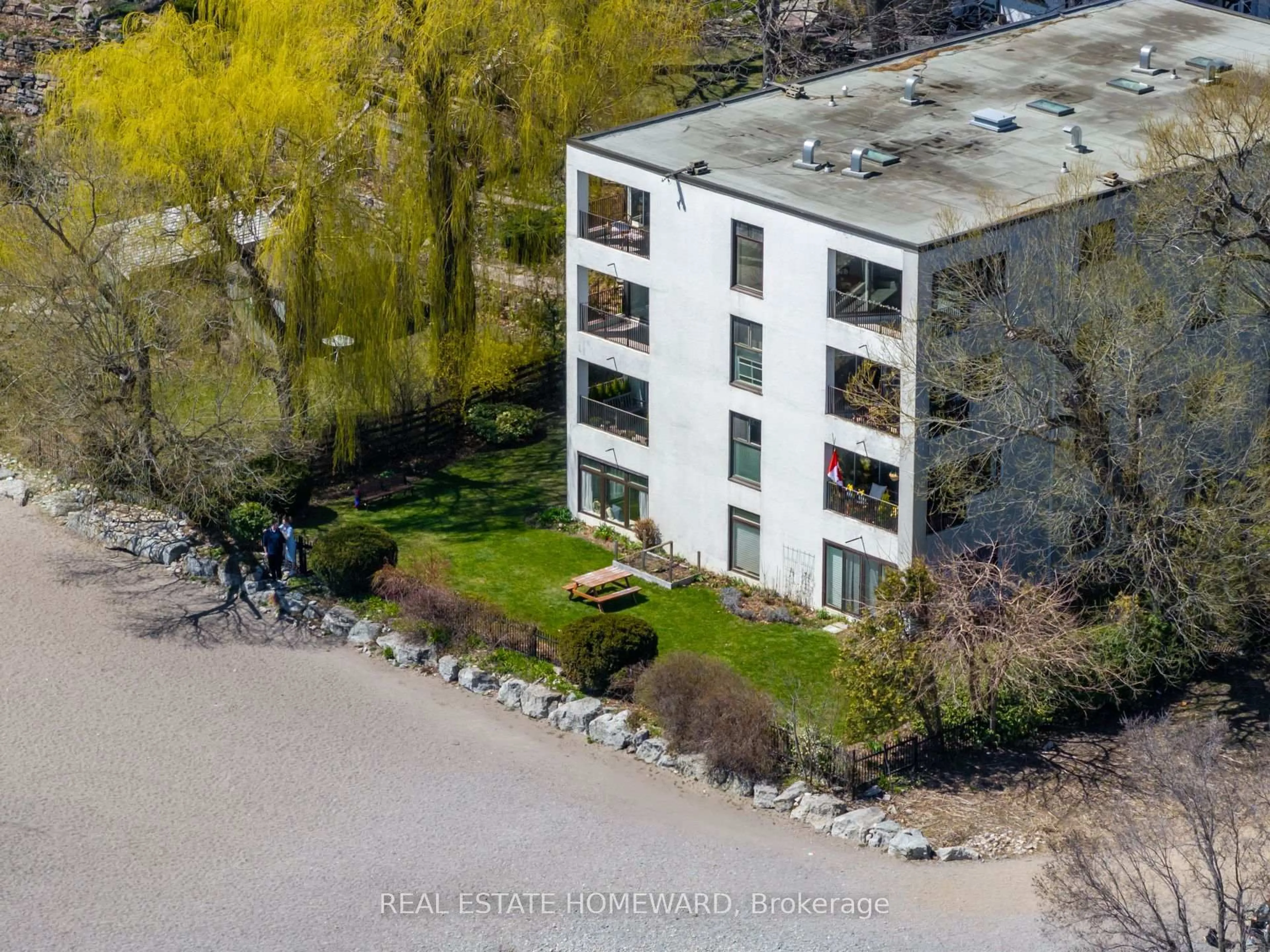 A pic from outside/outdoor area/front of a property/back of a property/a pic from drone, unknown for 2 Nursewood Rd #2, Toronto Ontario M4E 3R8