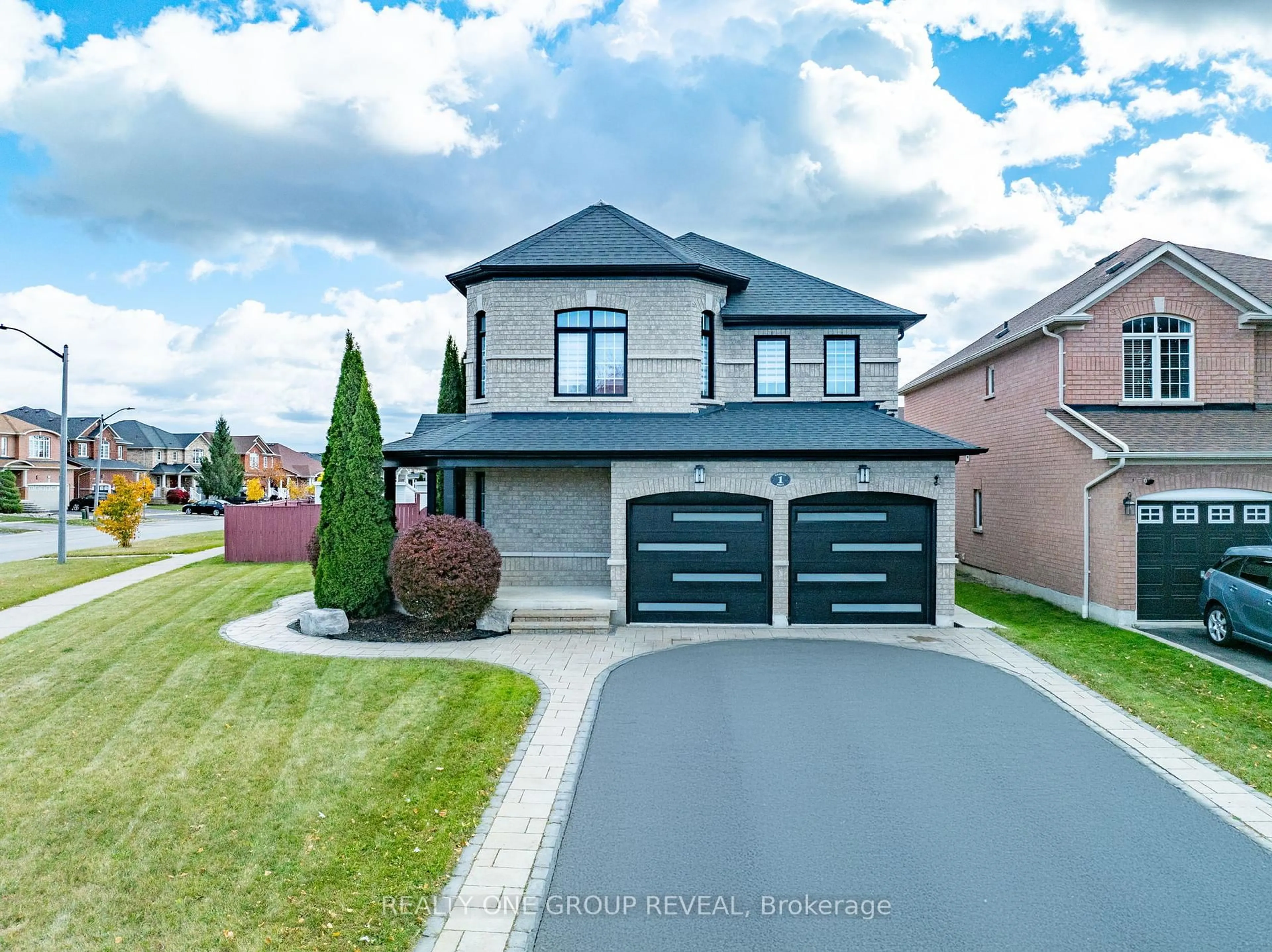 Home with brick exterior material, street for 1 Bridgid Dr, Whitby Ontario L1P 1T7