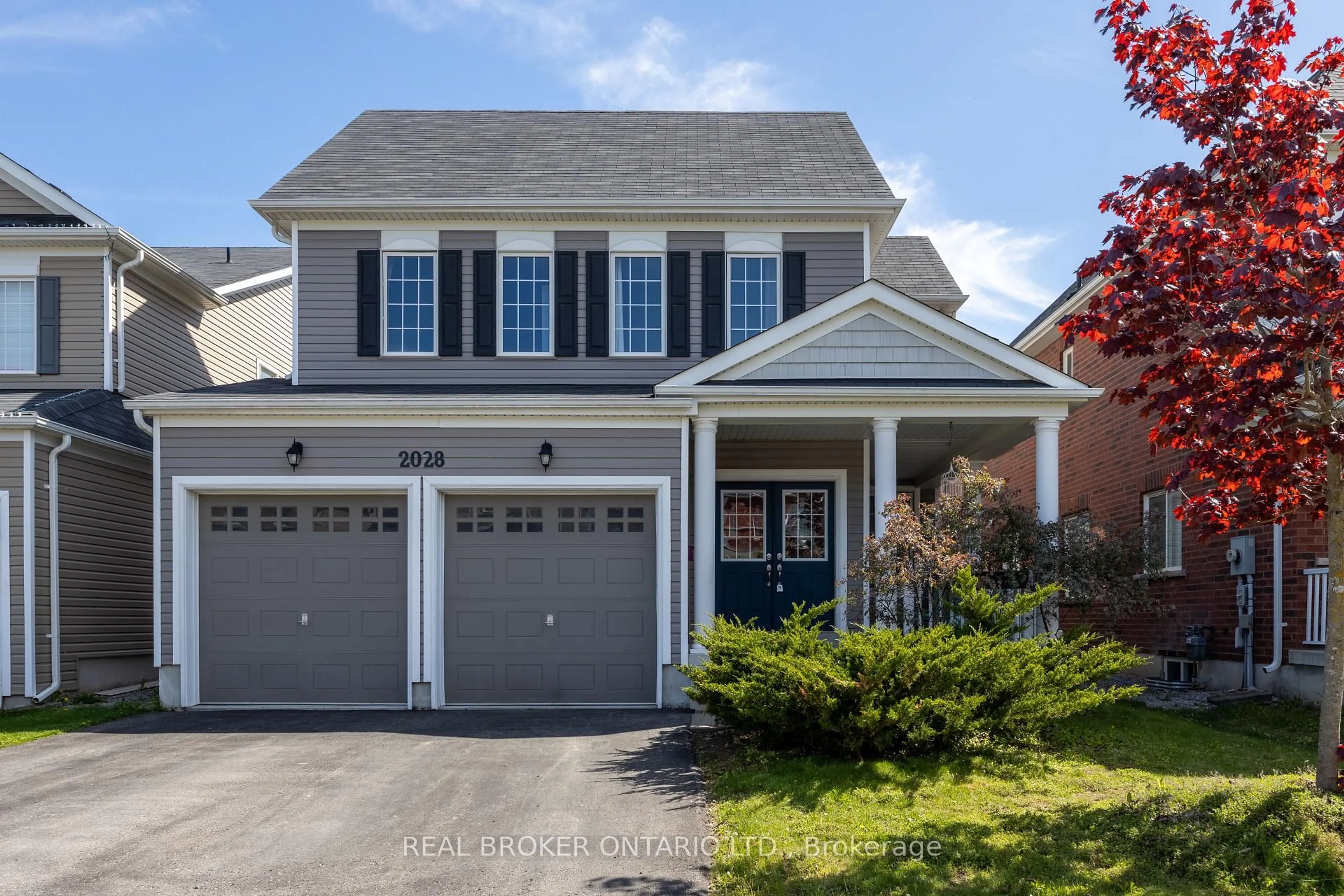 Home with vinyl exterior material, street for 2028 Hunking Dr, Oshawa Ontario L1K 0V3