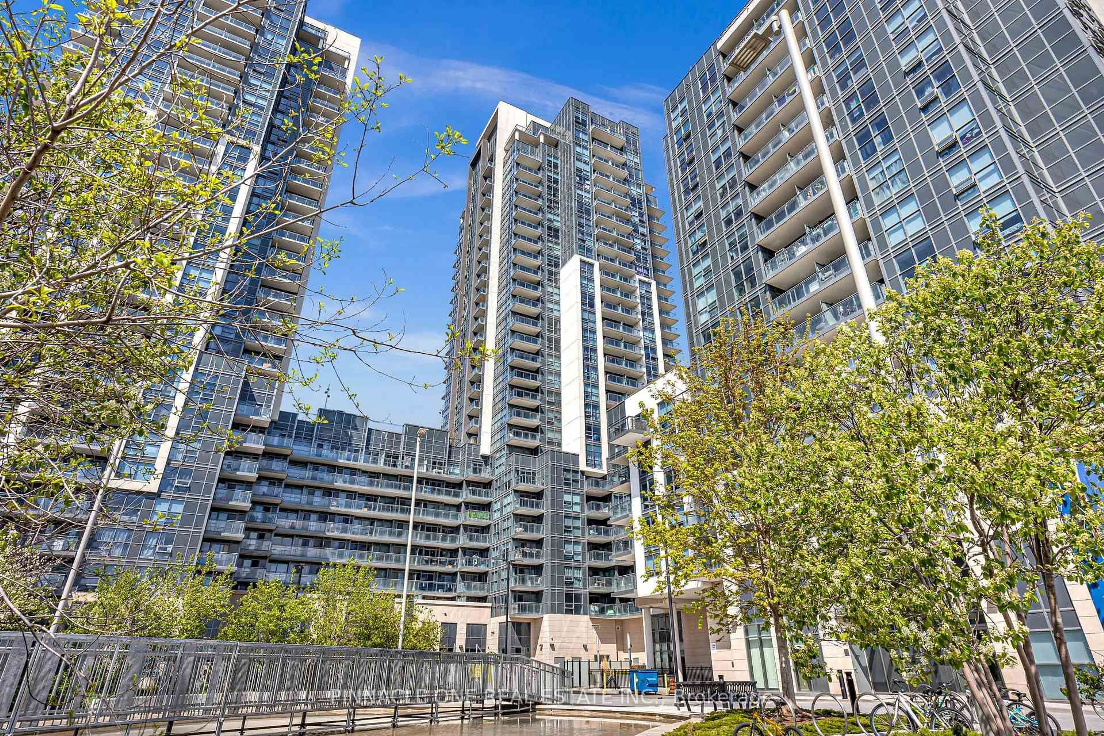 Patio, city buildings view from balcony for 30 Meadowglen Pl #213, Toronto Ontario M1G 0A6