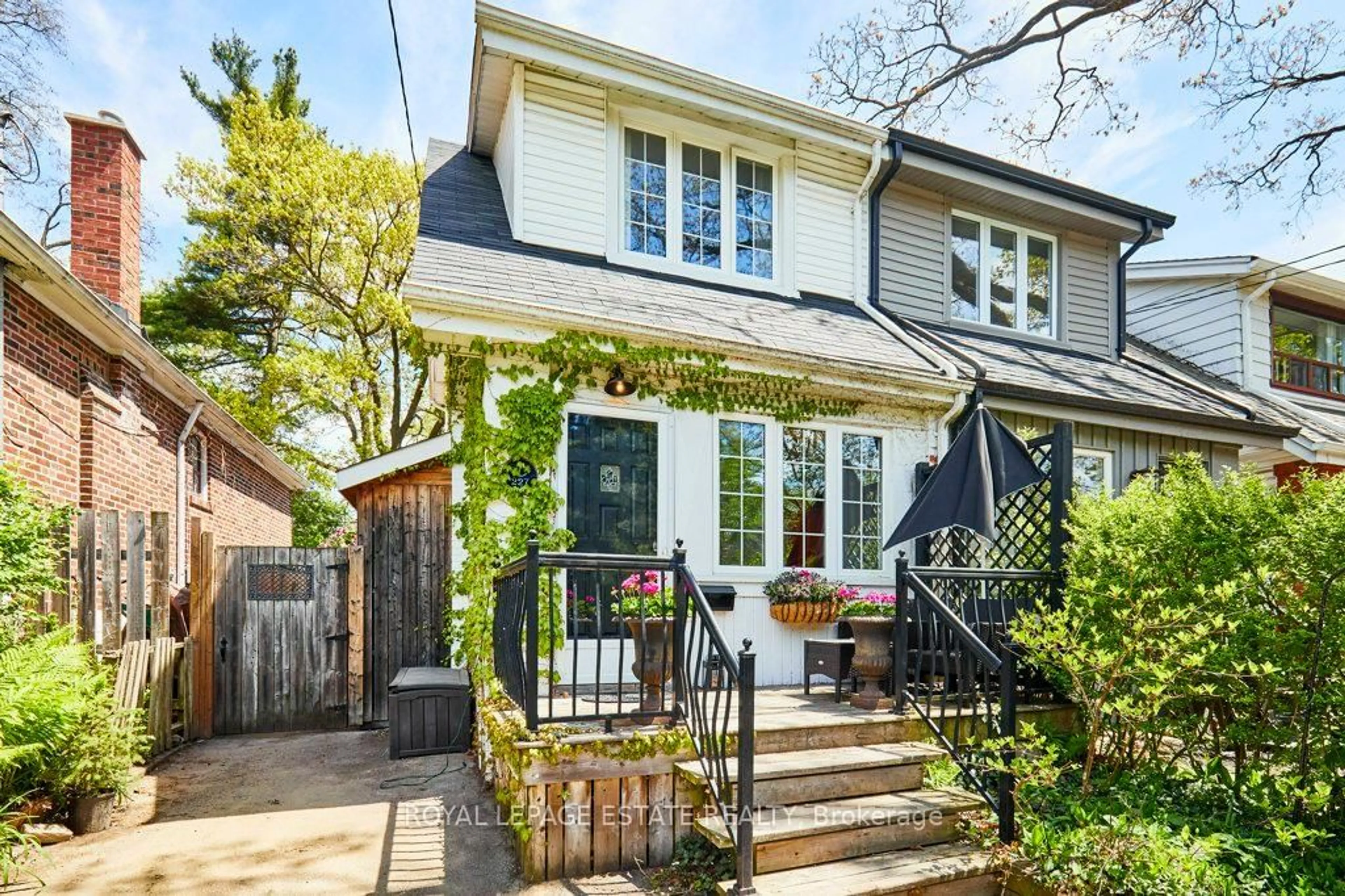 Home with brick exterior material, street for 227 Silver Birch Ave, Toronto Ontario M4E 3L6