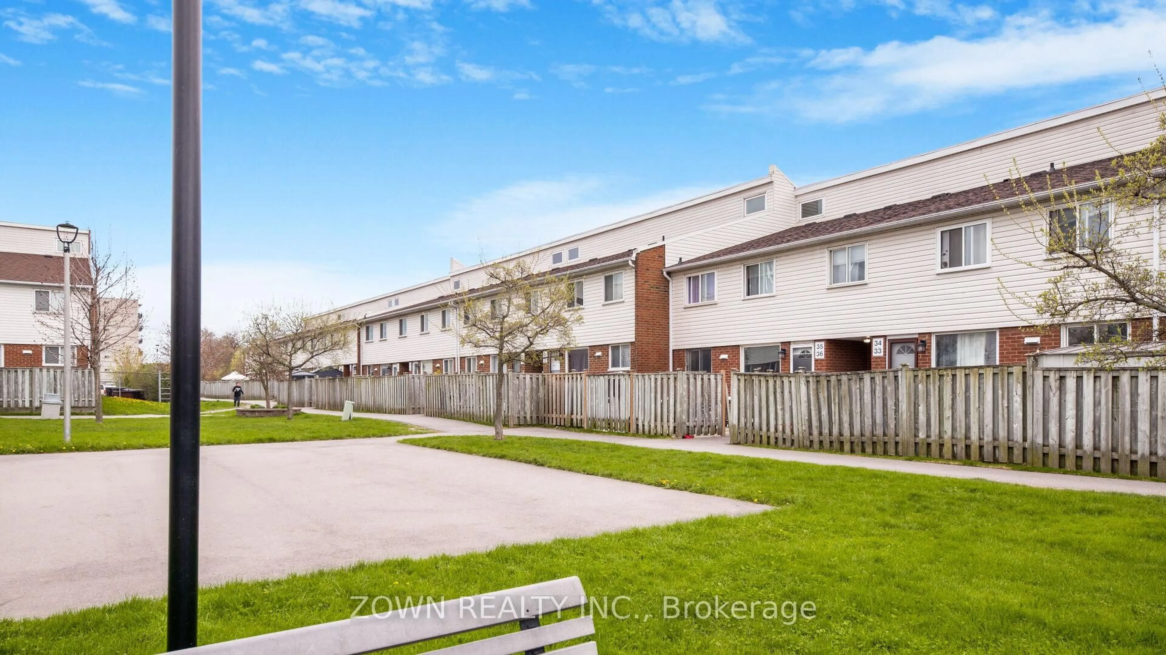 A pic from outside/outdoor area/front of a property/back of a property/a pic from drone, street for 401 Wenworth St #32, Oshawa Ontario L1J 6J1