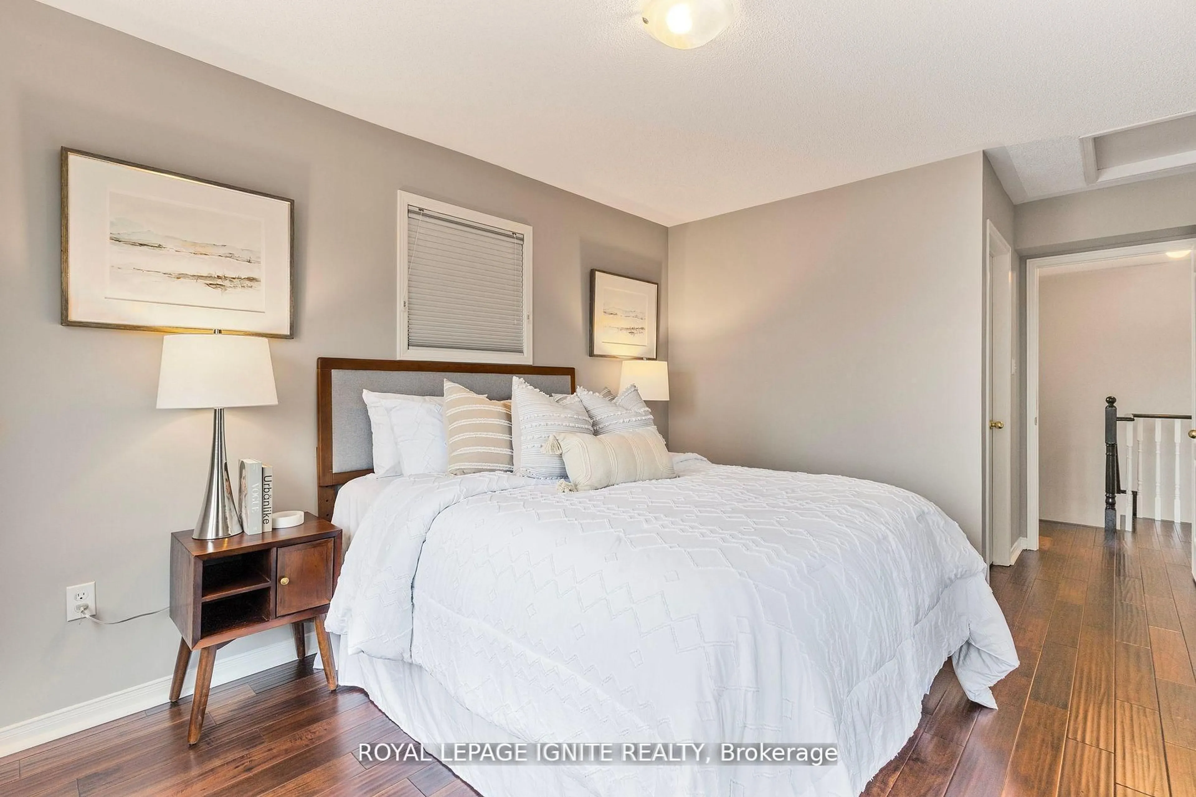 Bedroom with bed, wood/laminate floor for 6063 Kingston Rd #21, Toronto Ontario M1C 1K5