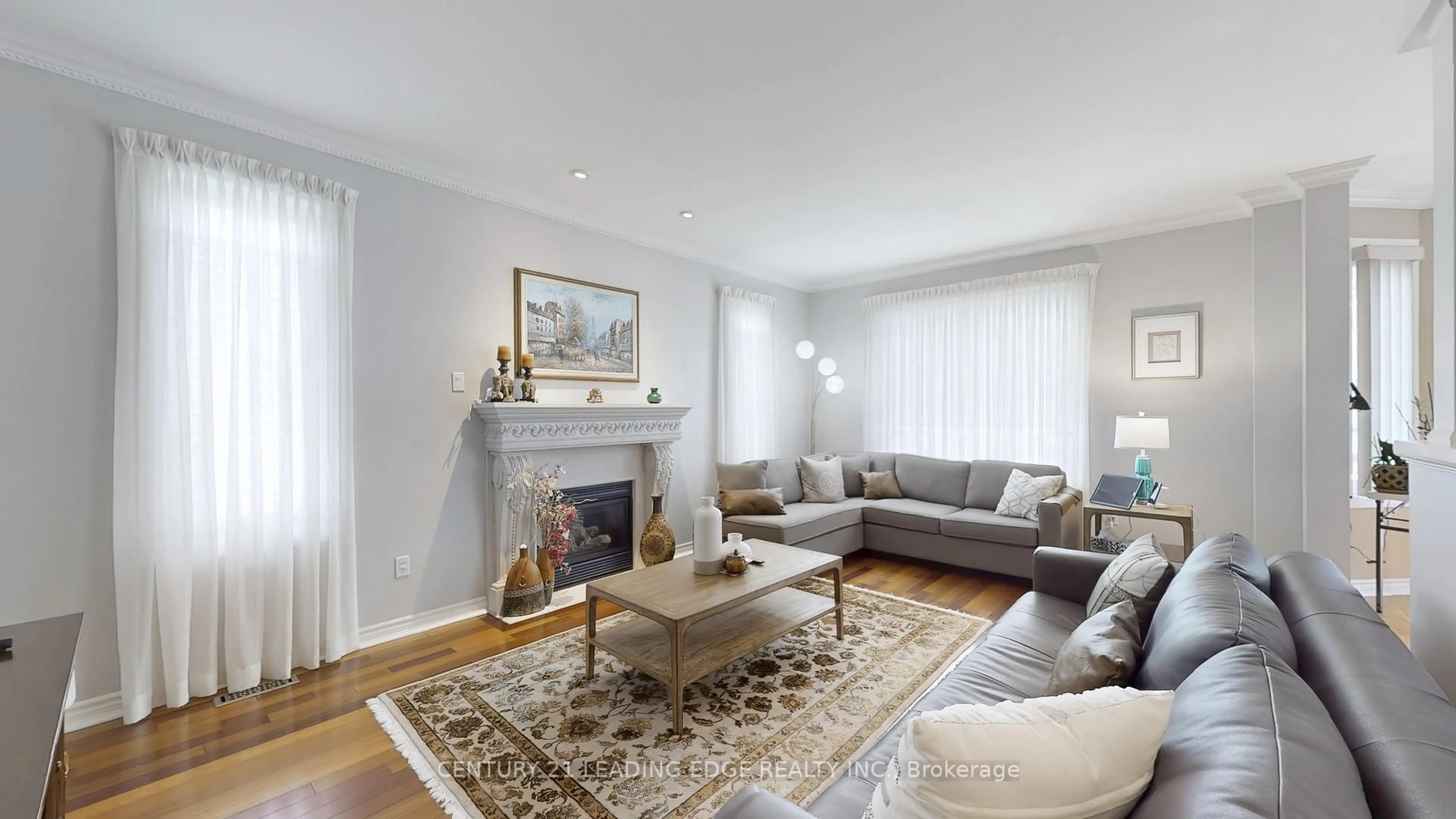 Living room with furniture, wood/laminate floor for 1915 Wildflower Dr, Pickering Ontario L1V 7A7