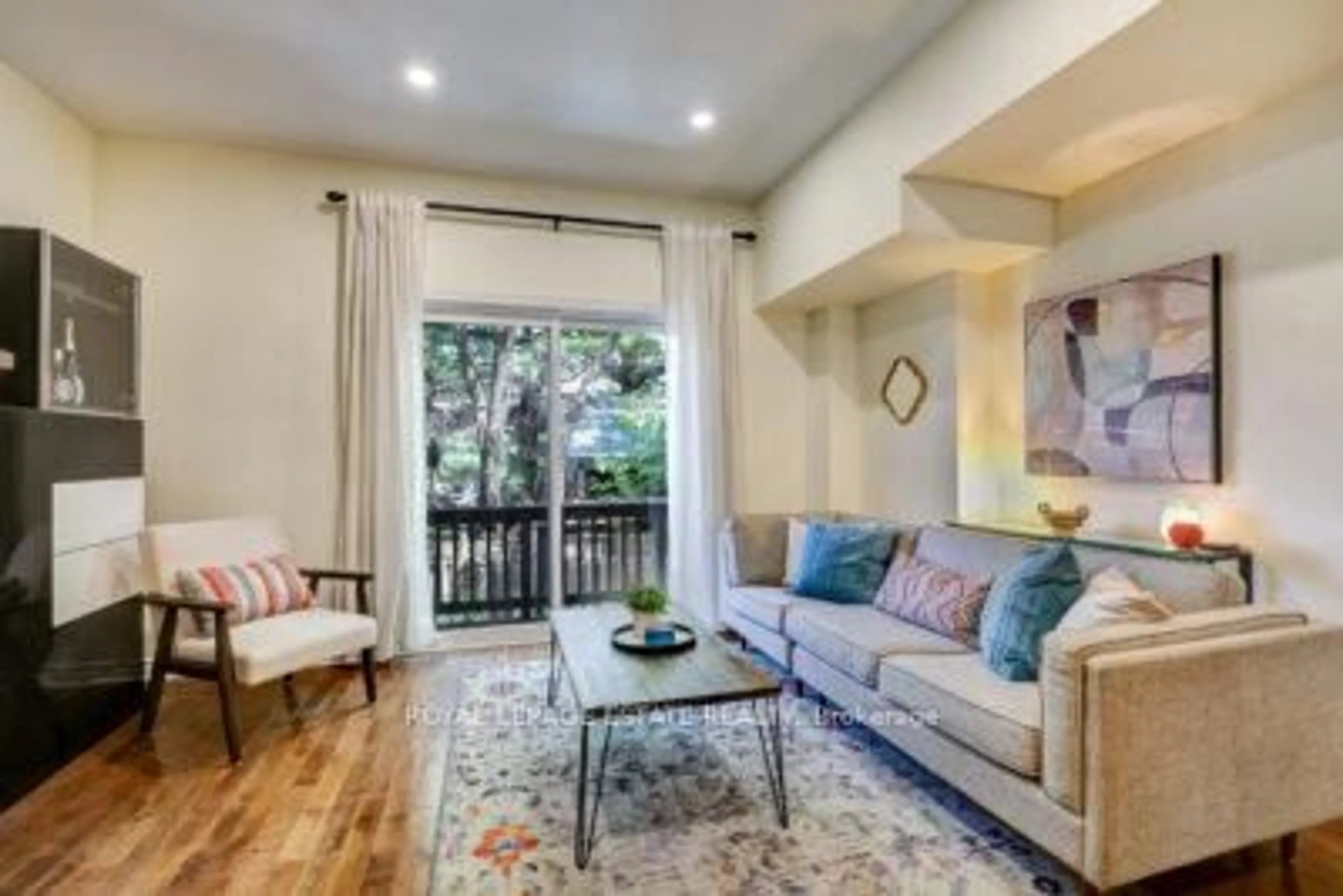 Living room with furniture, unknown for 23 Hodge Lane, Toronto Ontario M4E 3Y3