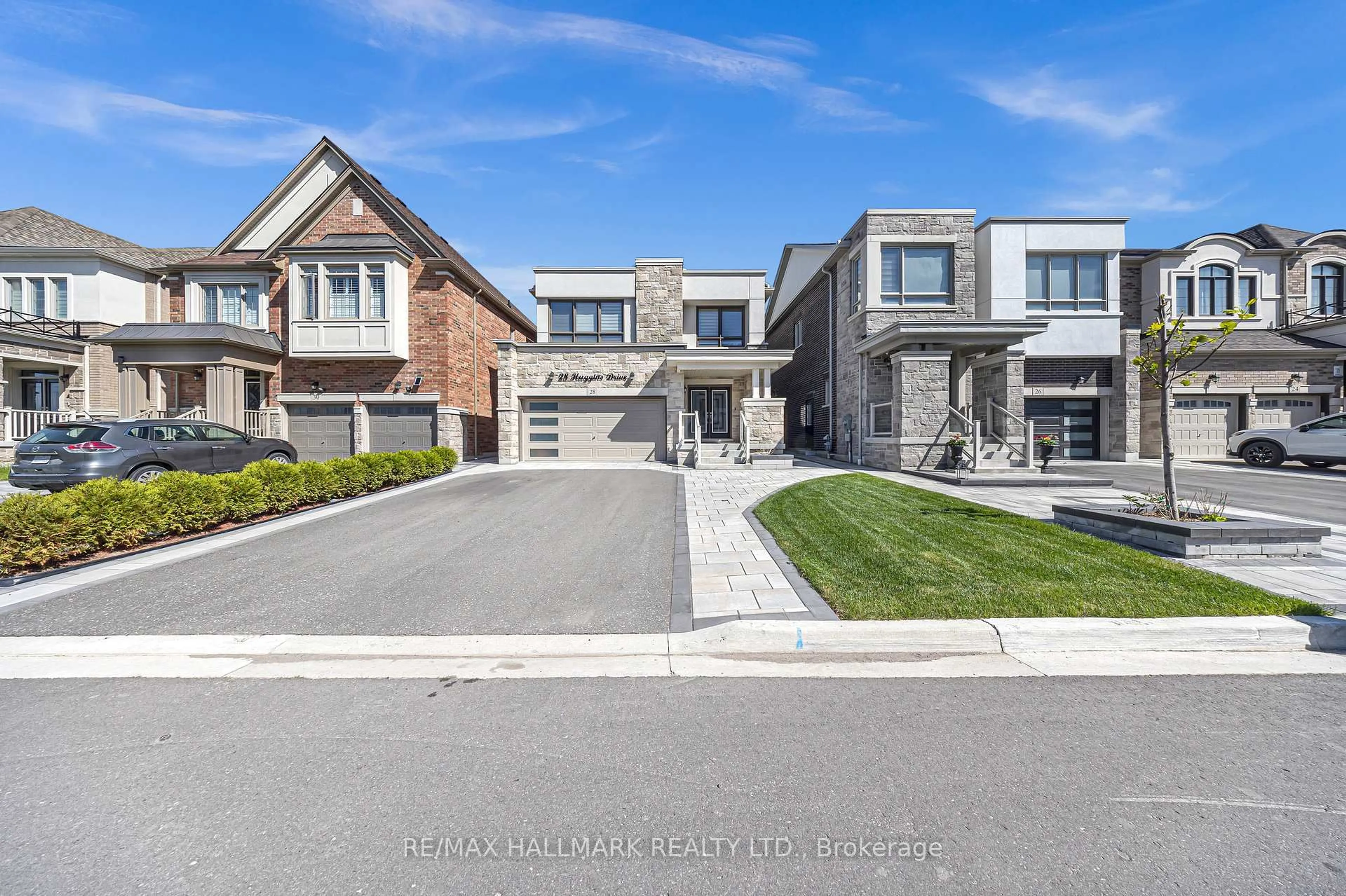 Home with brick exterior material, street for 28 Huggins Dr, Whitby Ontario L1P 0N4