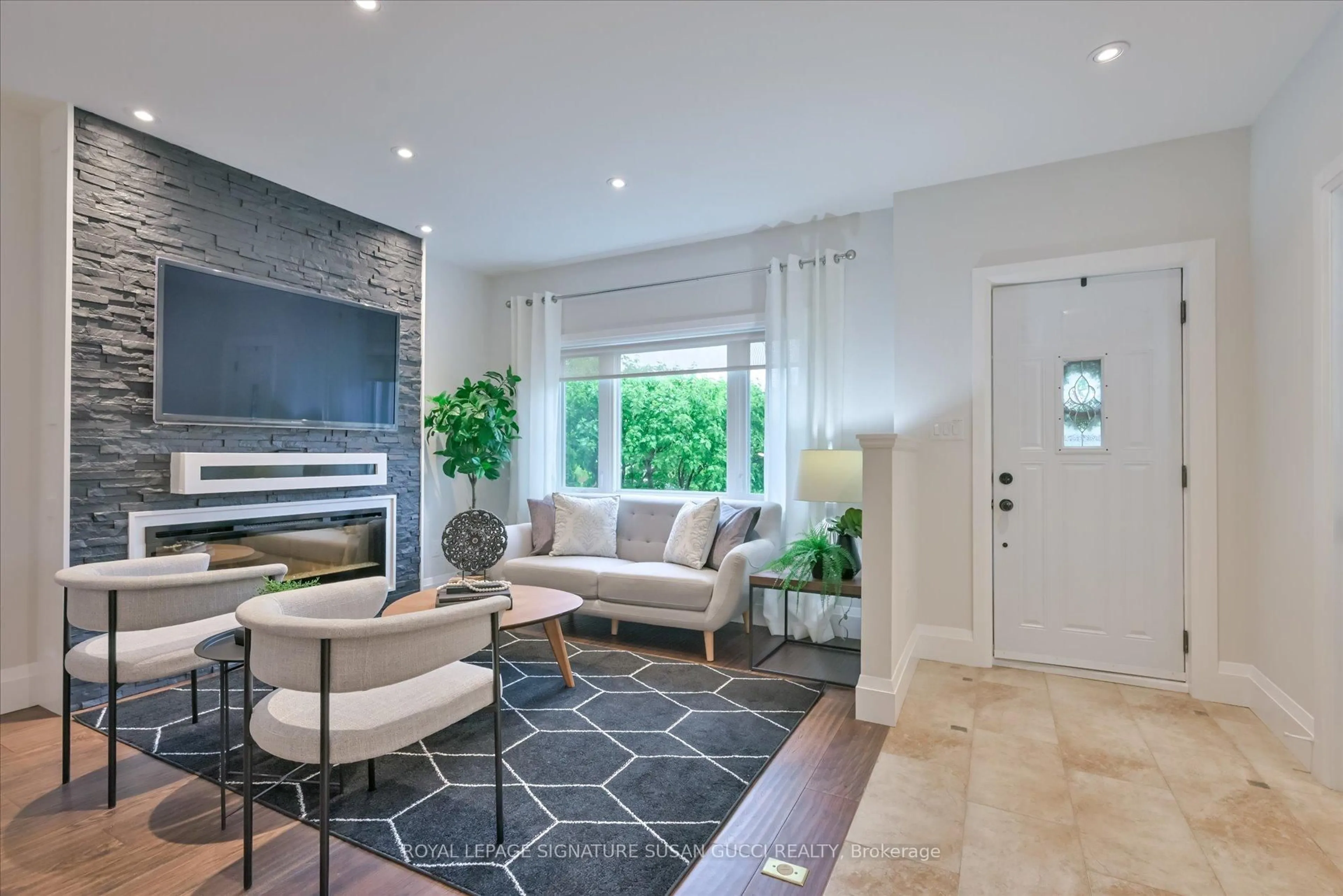 Living room with furniture, ceramic/tile floor for 3 Athlone Rd, Toronto Ontario M4J 4H1