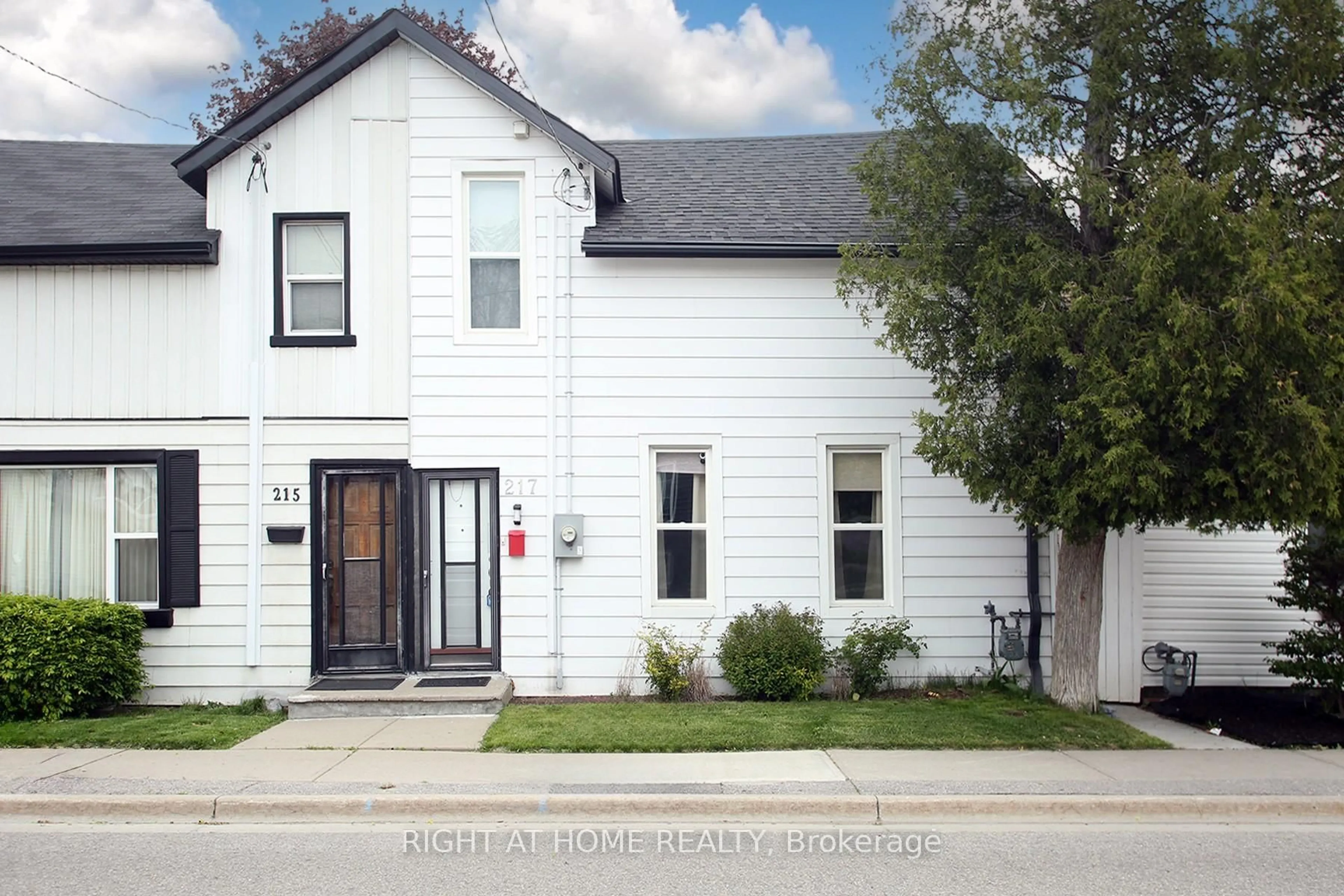 Home with brick exterior material, street for 217 Celina St, Oshawa Ontario L1H 4N7