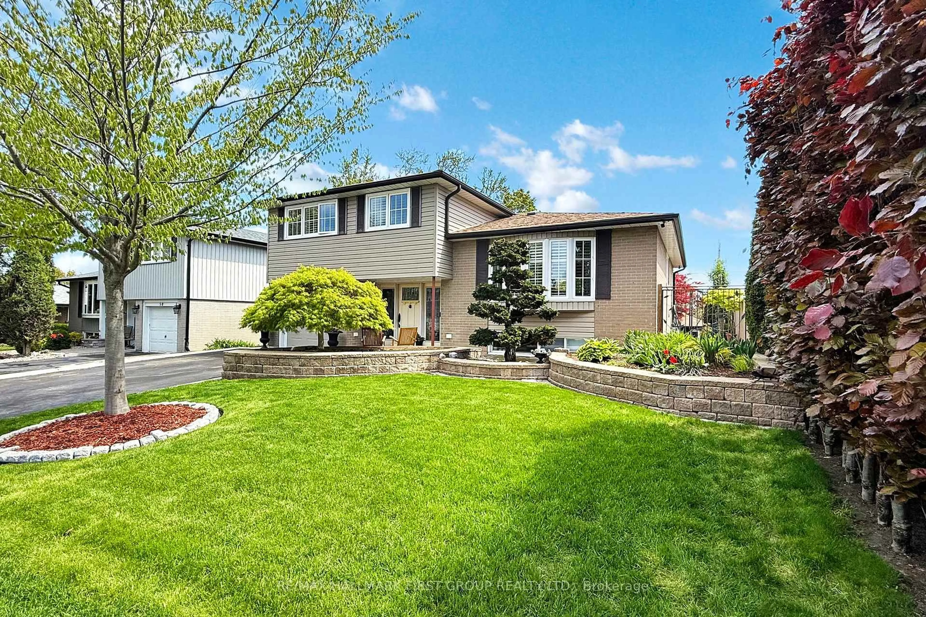 Home with vinyl exterior material, street for 48 Crawford Dr, Ajax Ontario L1S 3A8