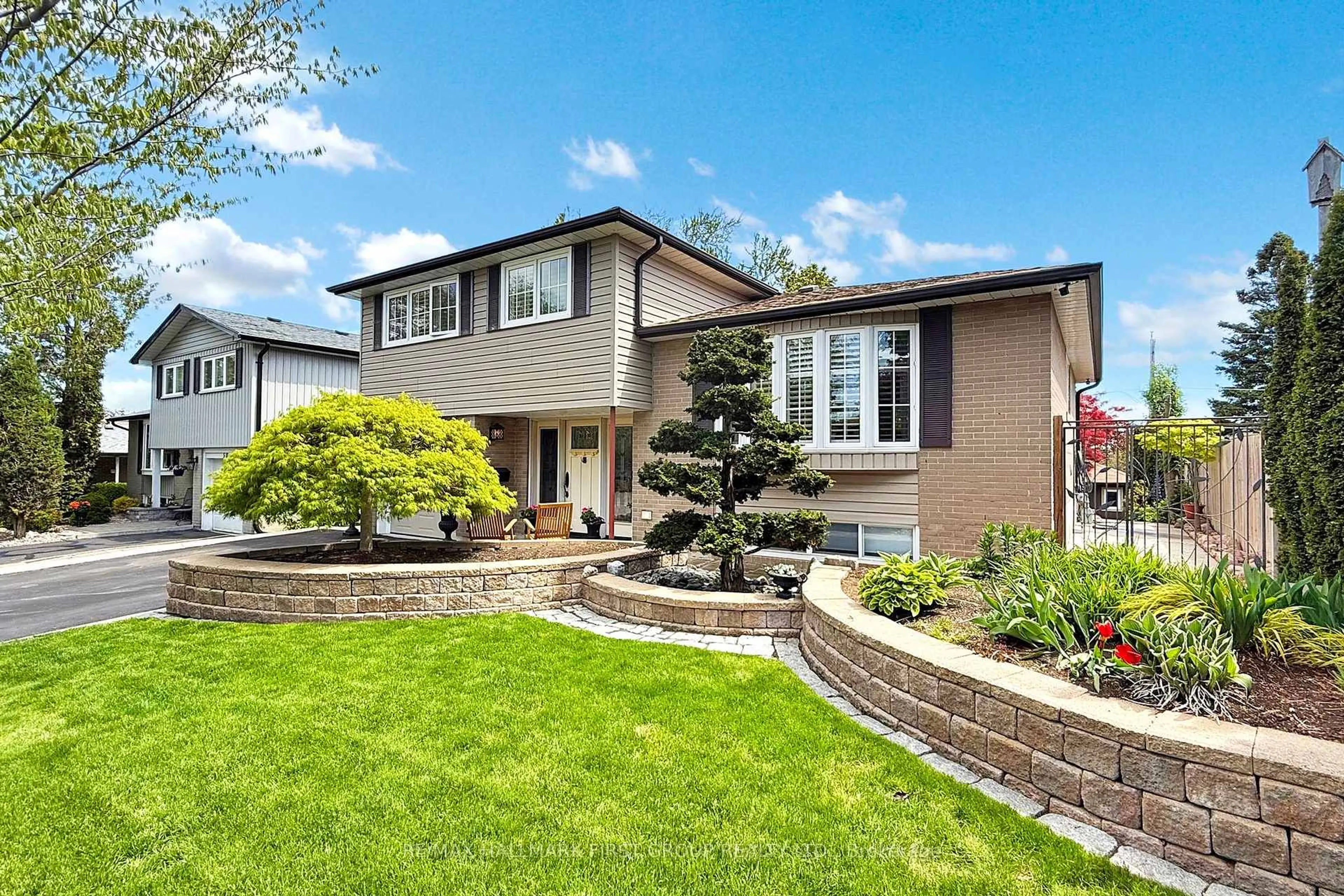Home with vinyl exterior material, street for 48 Crawford Dr, Ajax Ontario L1S 3A8