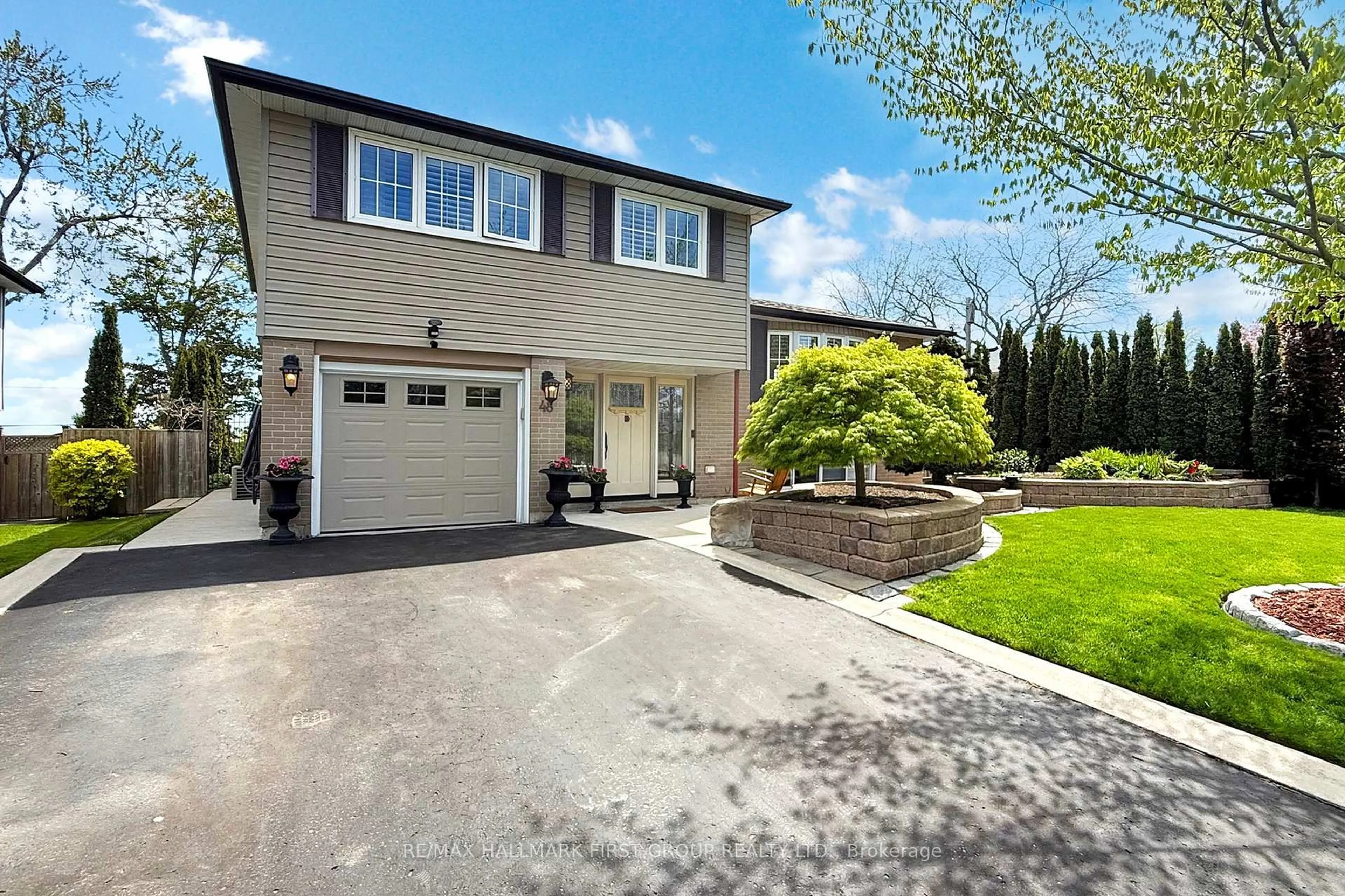Home with vinyl exterior material, street for 48 Crawford Dr, Ajax Ontario L1S 3A8