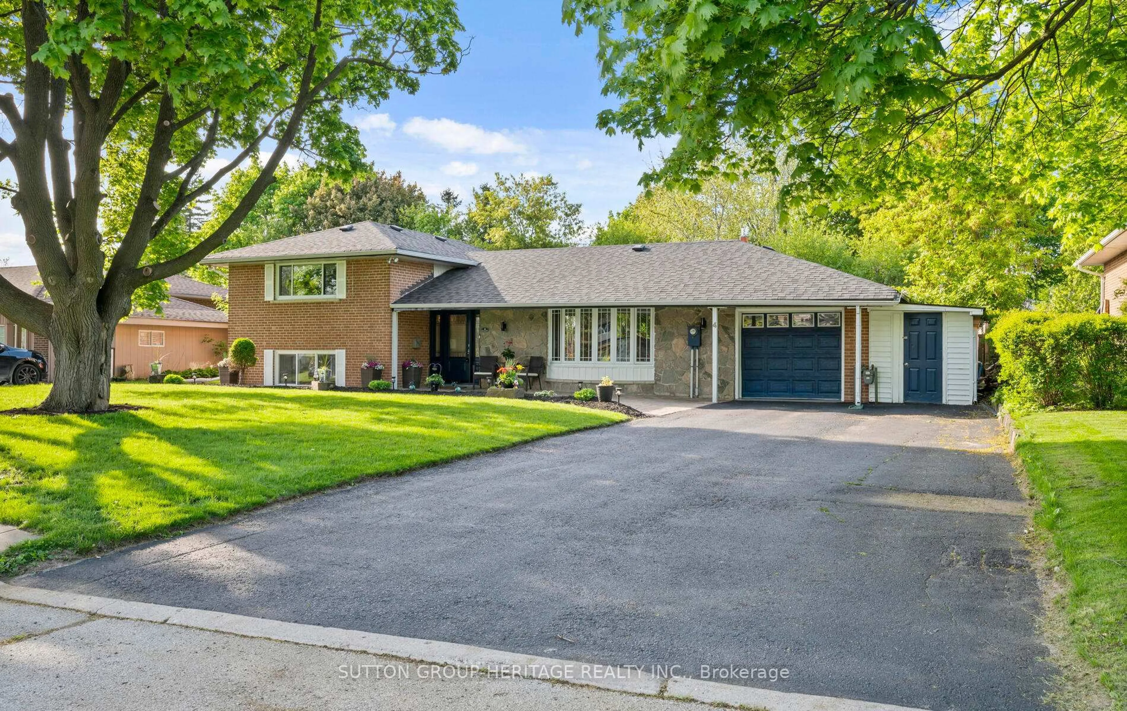 Home with brick exterior material, street for 4 Clarelyn Blvd, Ajax Ontario L1S 6G9
