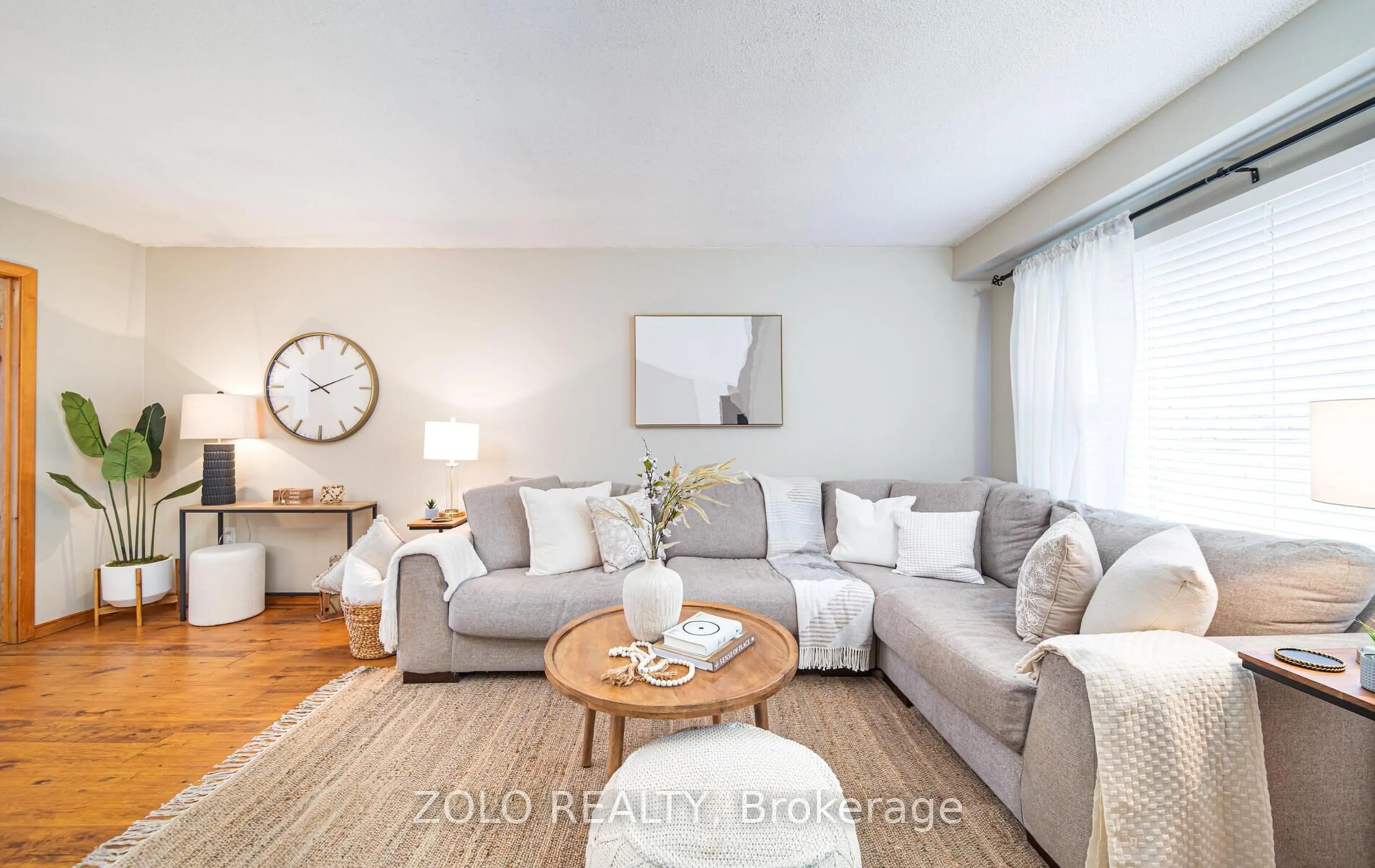 Living room with furniture, wood/laminate floor for 618 Galahad Dr, Oshawa Ontario L1K 1M2