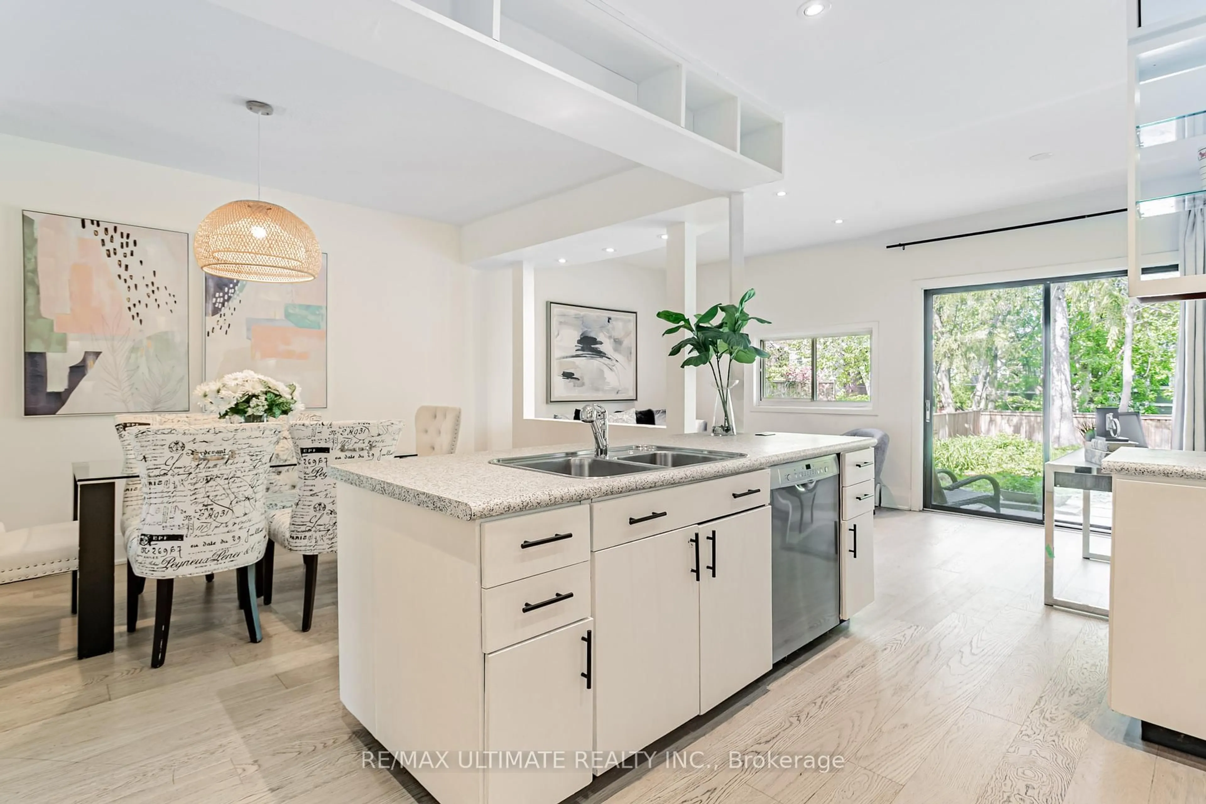 Open concept kitchen, ceramic/tile floor for 275 Kenilworth Ave, Toronto Ontario M4L 3S9