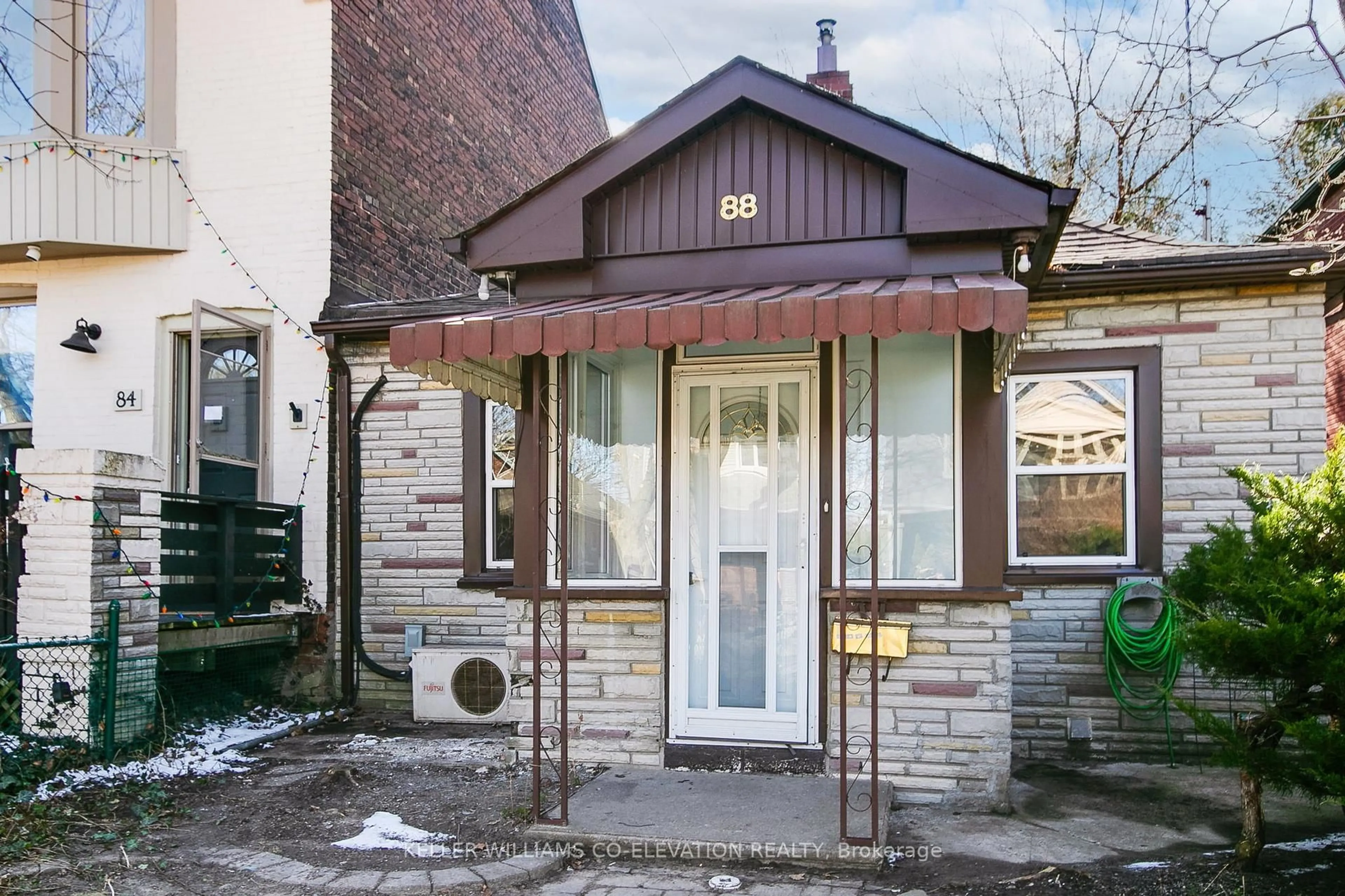 Home with brick exterior material, street for 88 Redwood Ave, Toronto Ontario M4L 2S6
