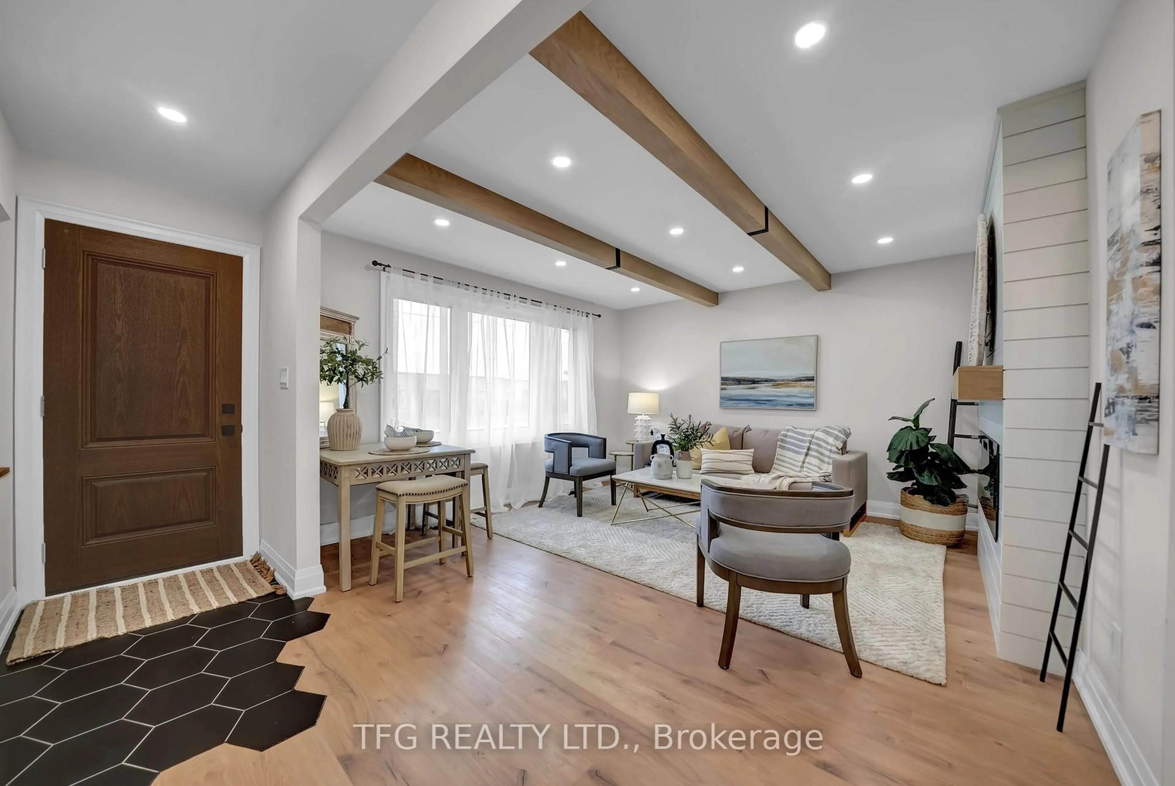 Living room with furniture, wood/laminate floor for 571 Stevenson Rd, Oshawa Ontario L1J 5N9