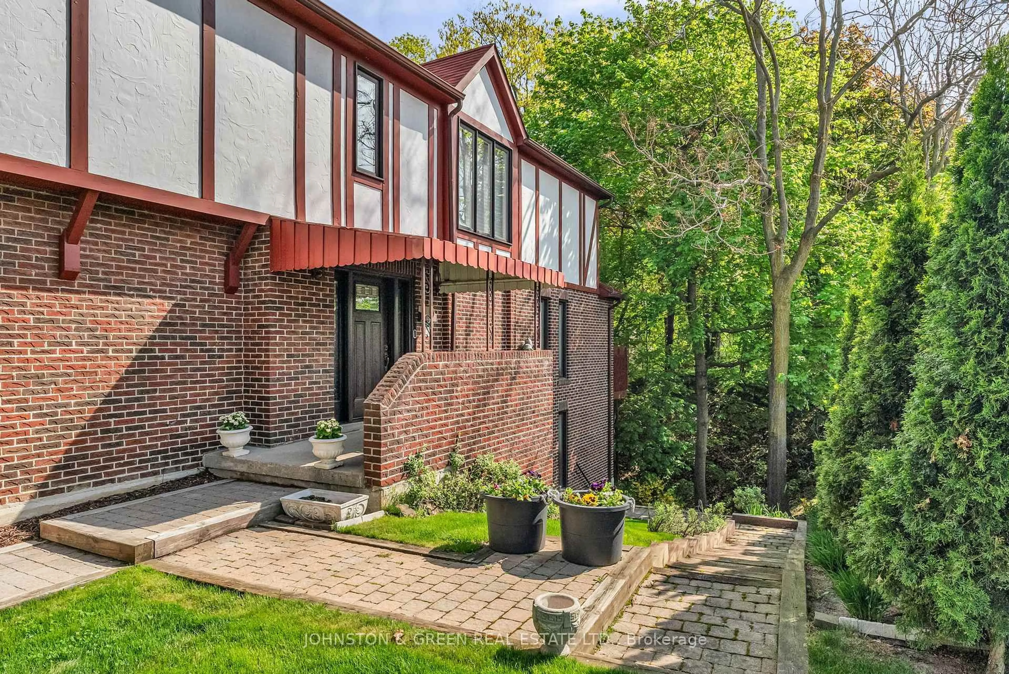 Home with brick exterior material, street for 1 Woodvale Cres, Toronto Ontario M4C 5N4