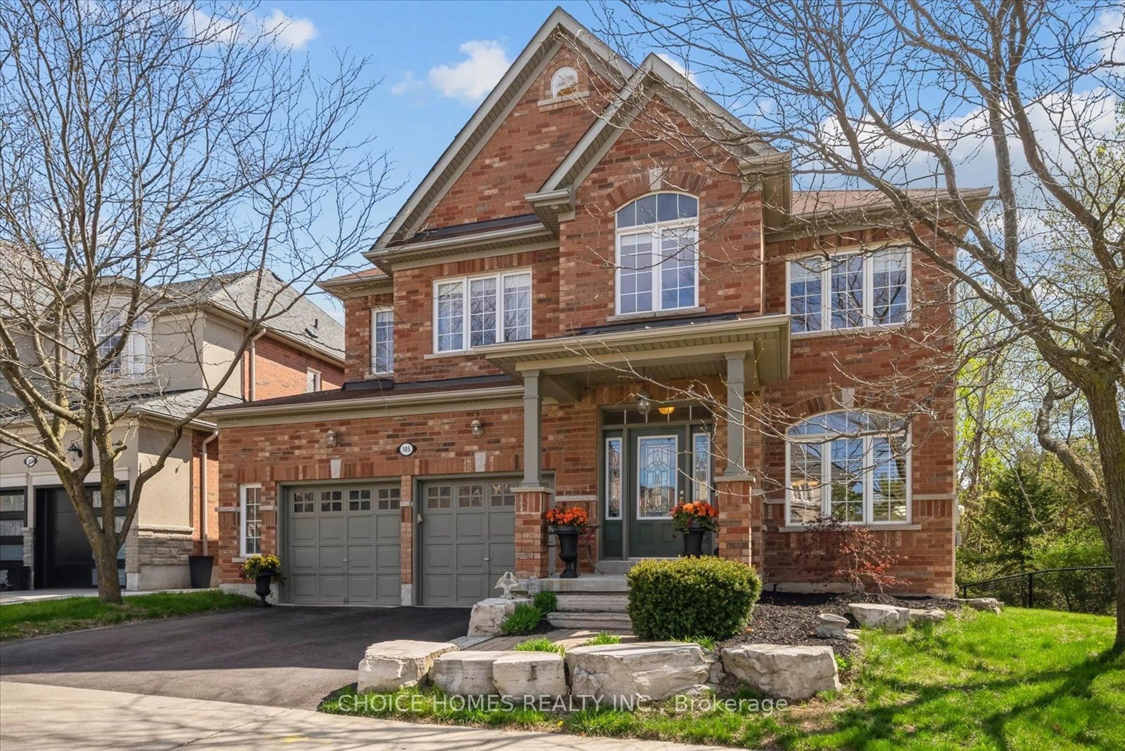 Home with brick exterior material, street for 105 Rivers Edge Pl, Whitby Ontario L1R 0G5