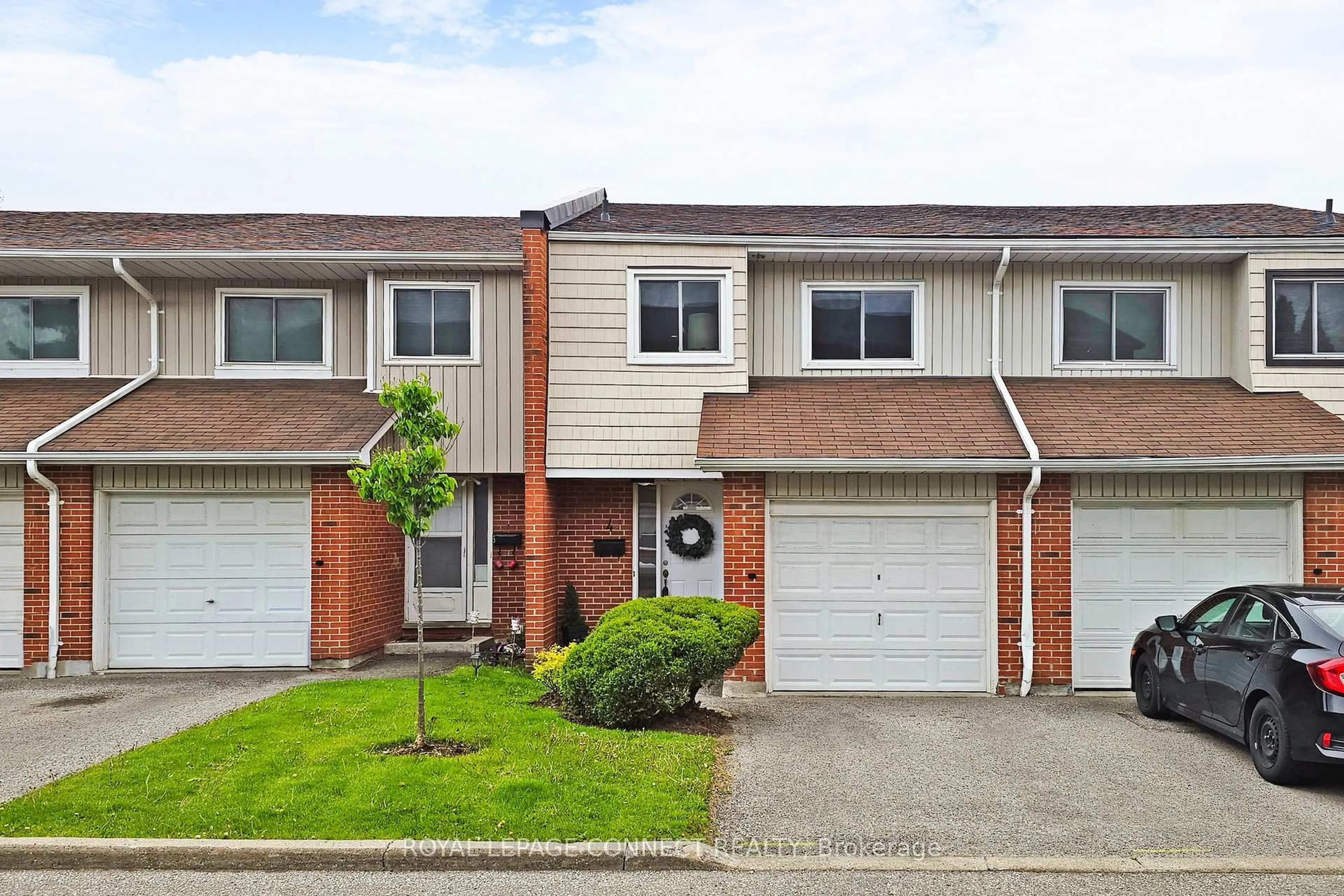 Home with brick exterior material, street for 1975 Rosefield Rd #4, Pickering Ontario L1V 3E3