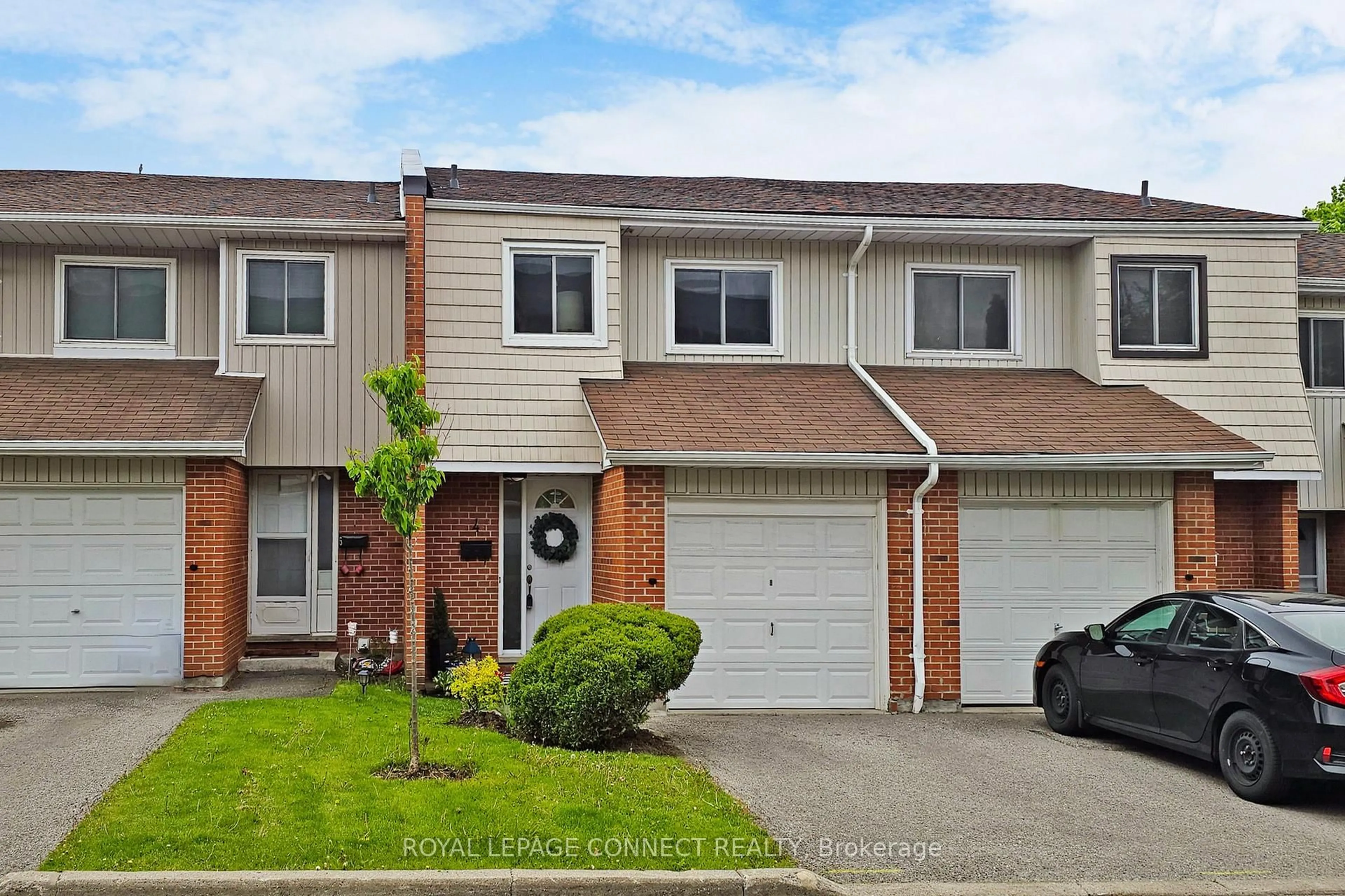 Home with vinyl exterior material, street for 1975 Rosefield Rd #4, Pickering Ontario L1V 3E3