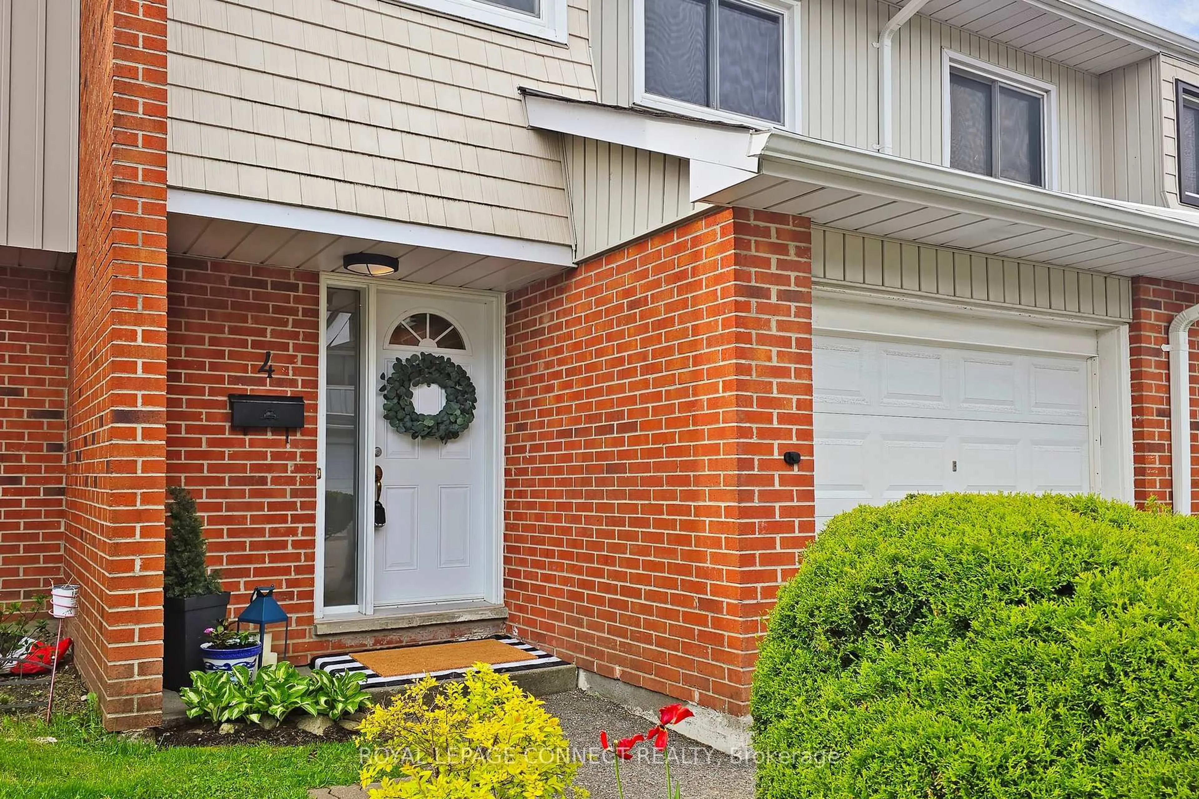 Home with brick exterior material, street for 1975 Rosefield Rd #4, Pickering Ontario L1V 3E3