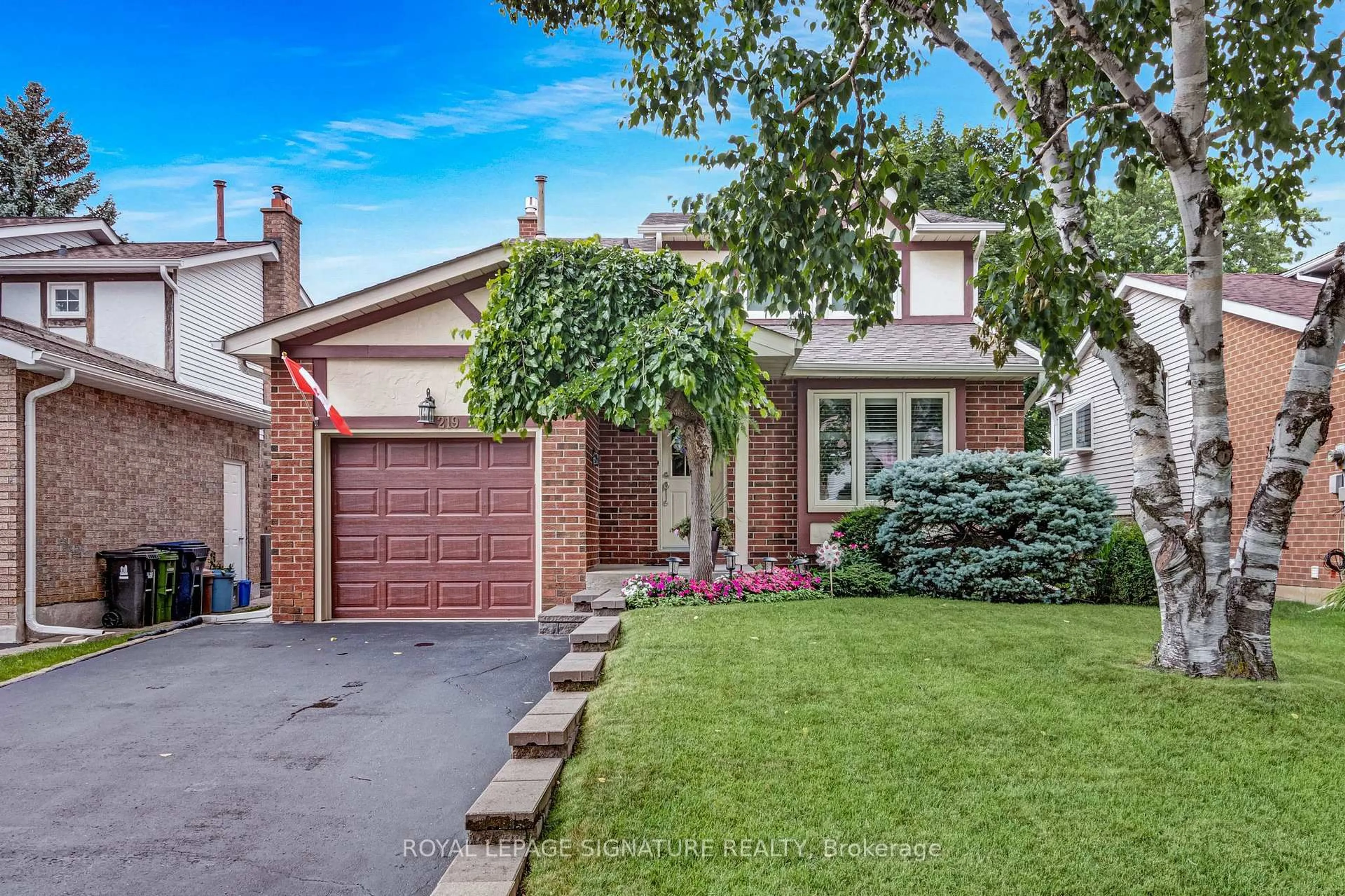 Home with brick exterior material, street for 219 Goldhawk Tr, Toronto Ontario M1V 1X4