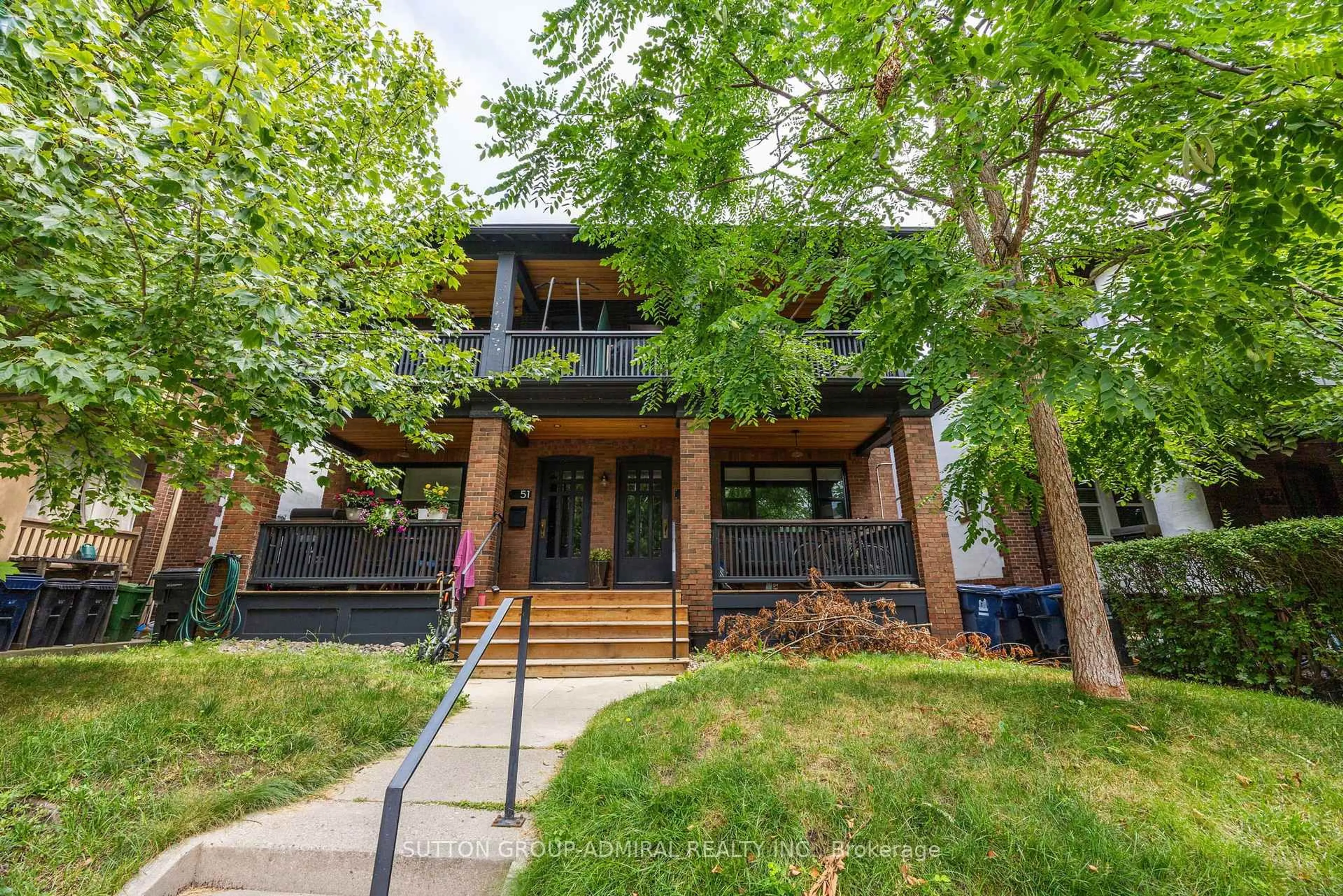 Home with brick exterior material, street for 49 & 51 Wineva Ave, Toronto Ontario M4E 2T1