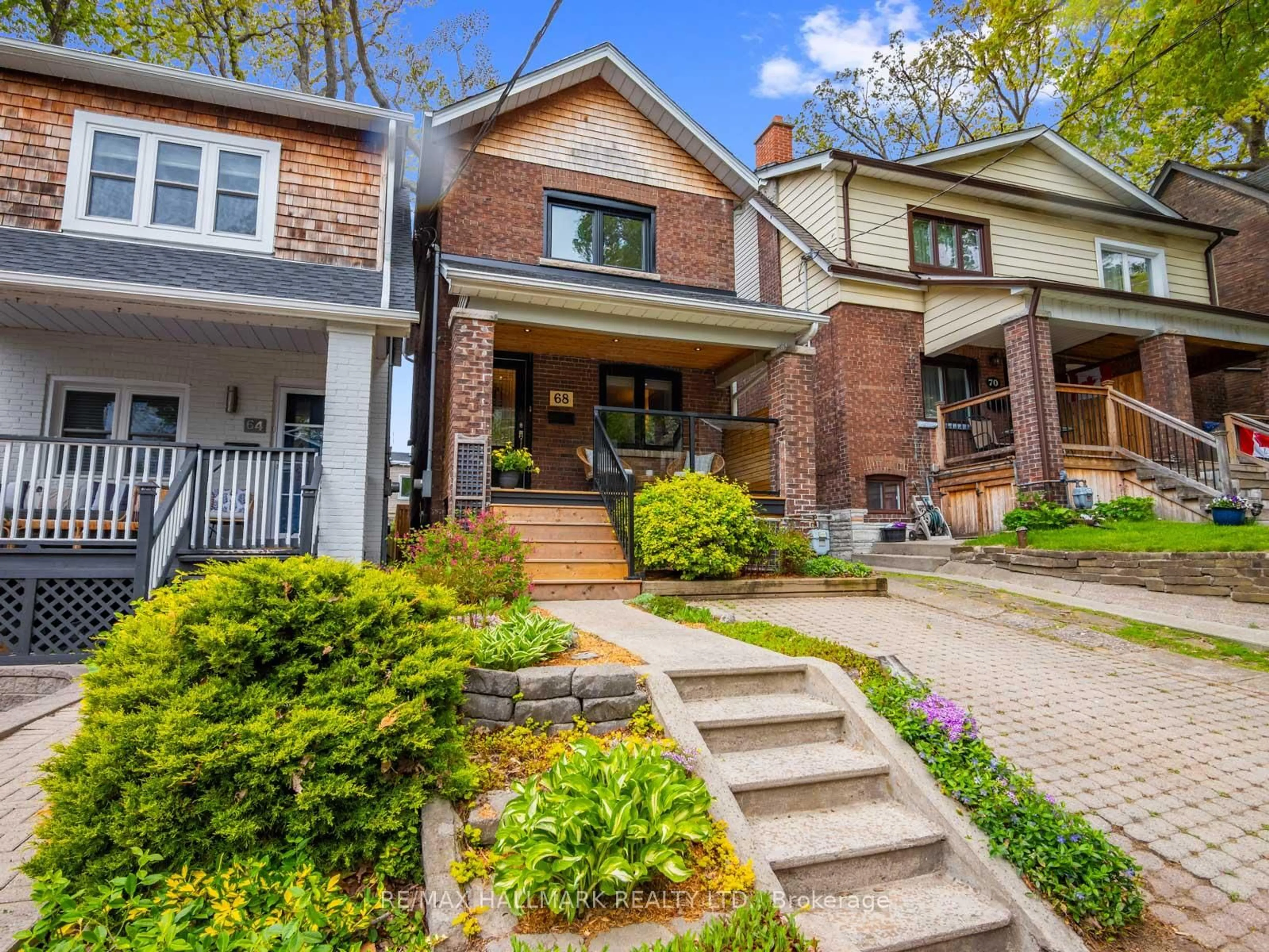Home with brick exterior material, street for 68 Bellhaven Rd, Toronto Ontario M4L 3J6