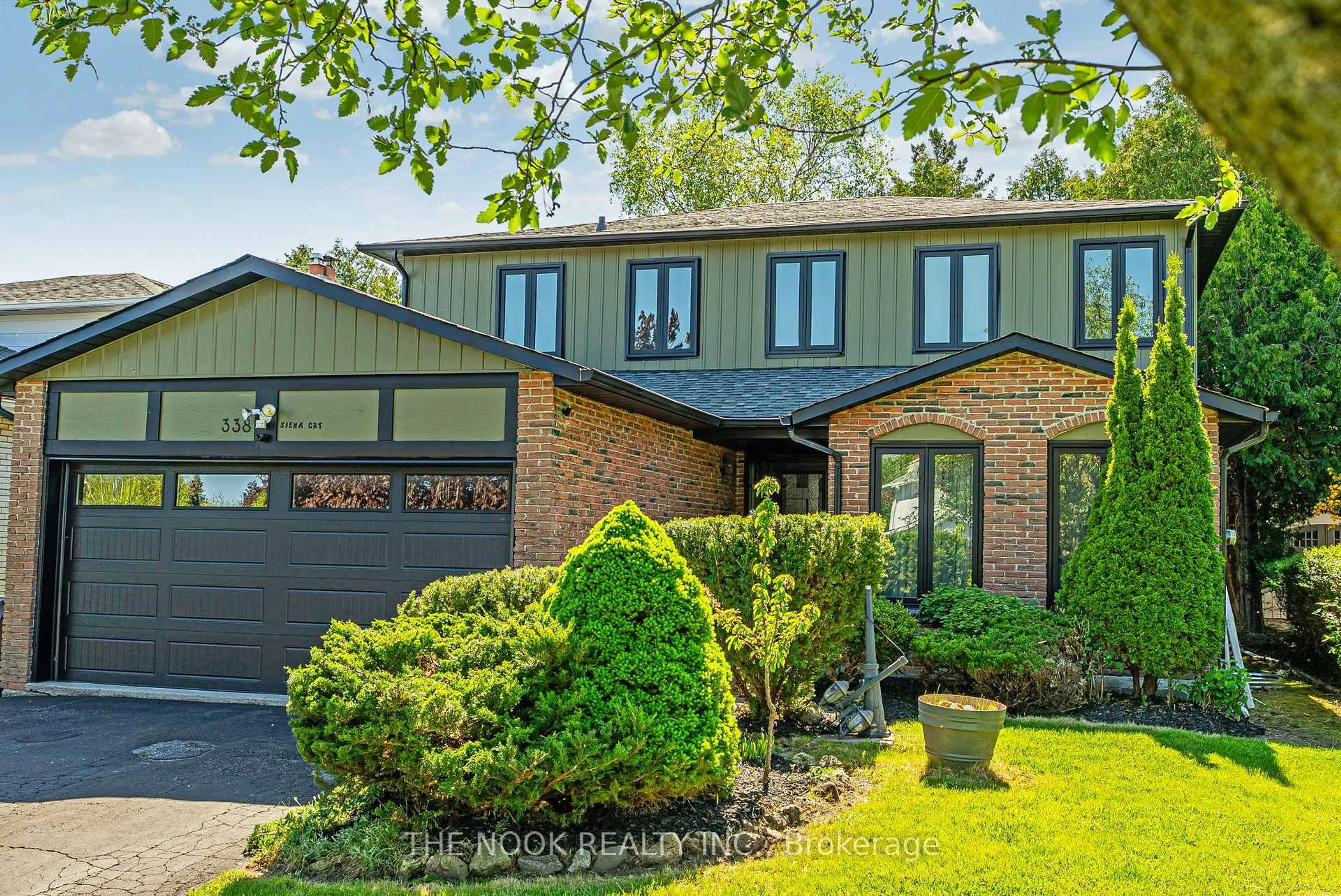 Home with brick exterior material, street for 338 Siena Crt, Oshawa Ontario L1J 6V5