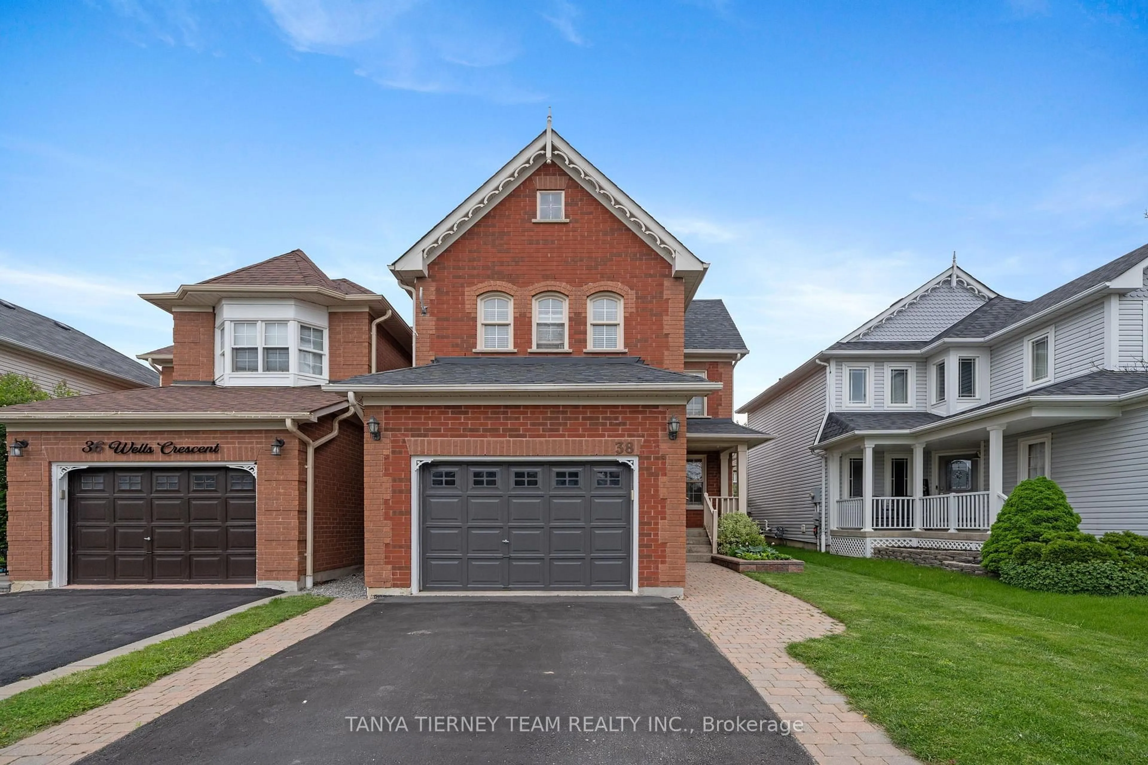 Home with brick exterior material, street for 38 Wells Cres, Whitby Ontario L1M 1C9