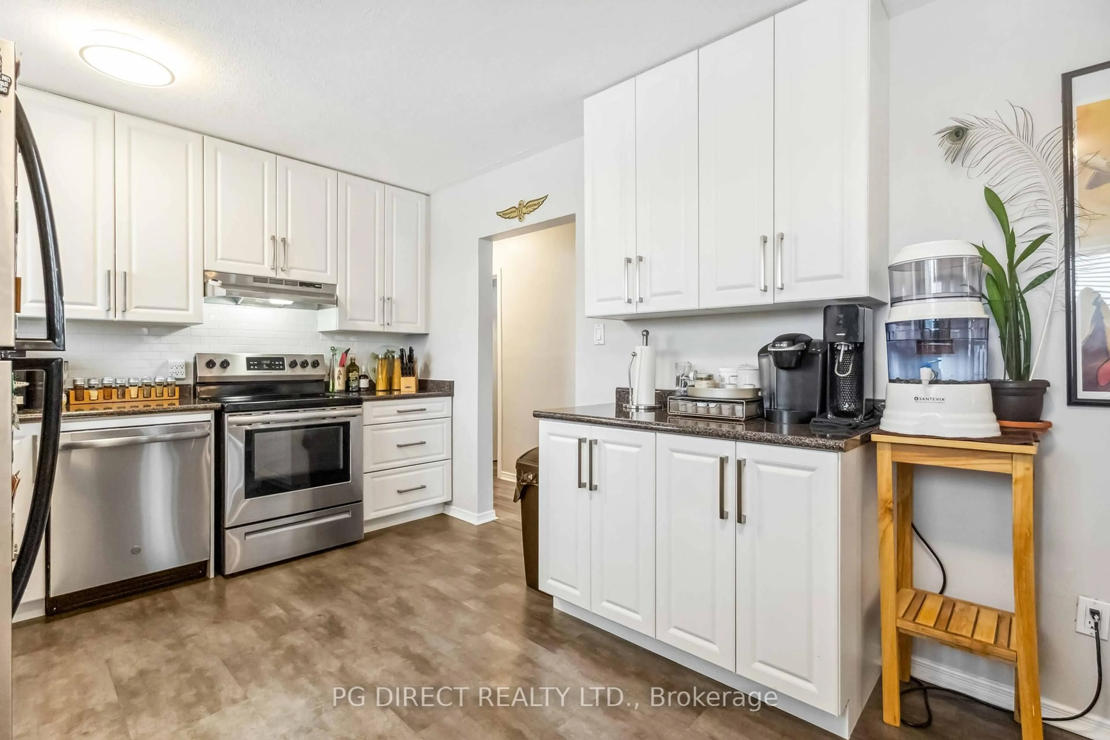 Open concept kitchen, wood/laminate floor for 120 Seneca Ave, Oshawa Ontario L1G 3V4