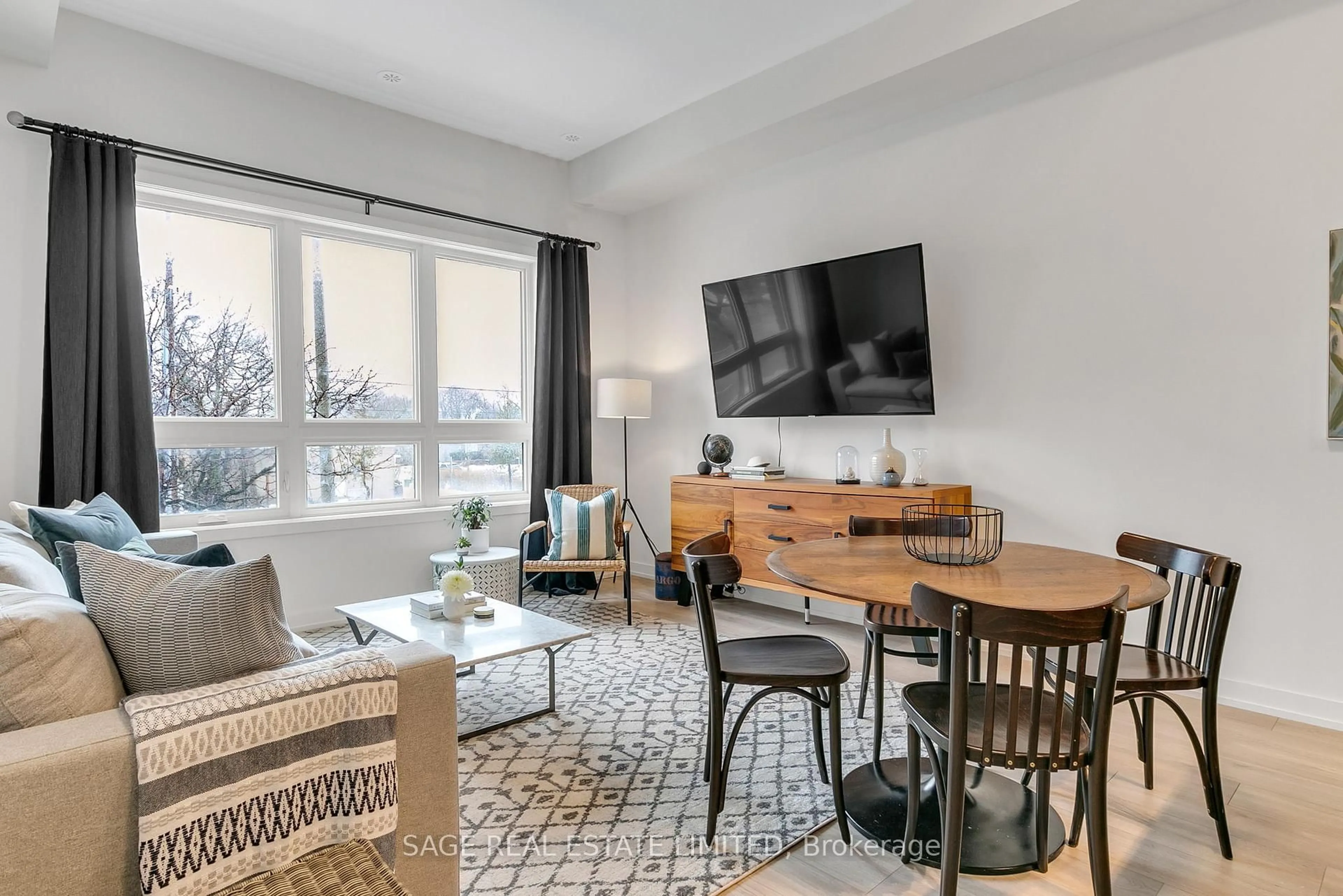 Living room with furniture, unknown for 3686 St Clair Ave #103, Toronto Ontario M1M 0E4