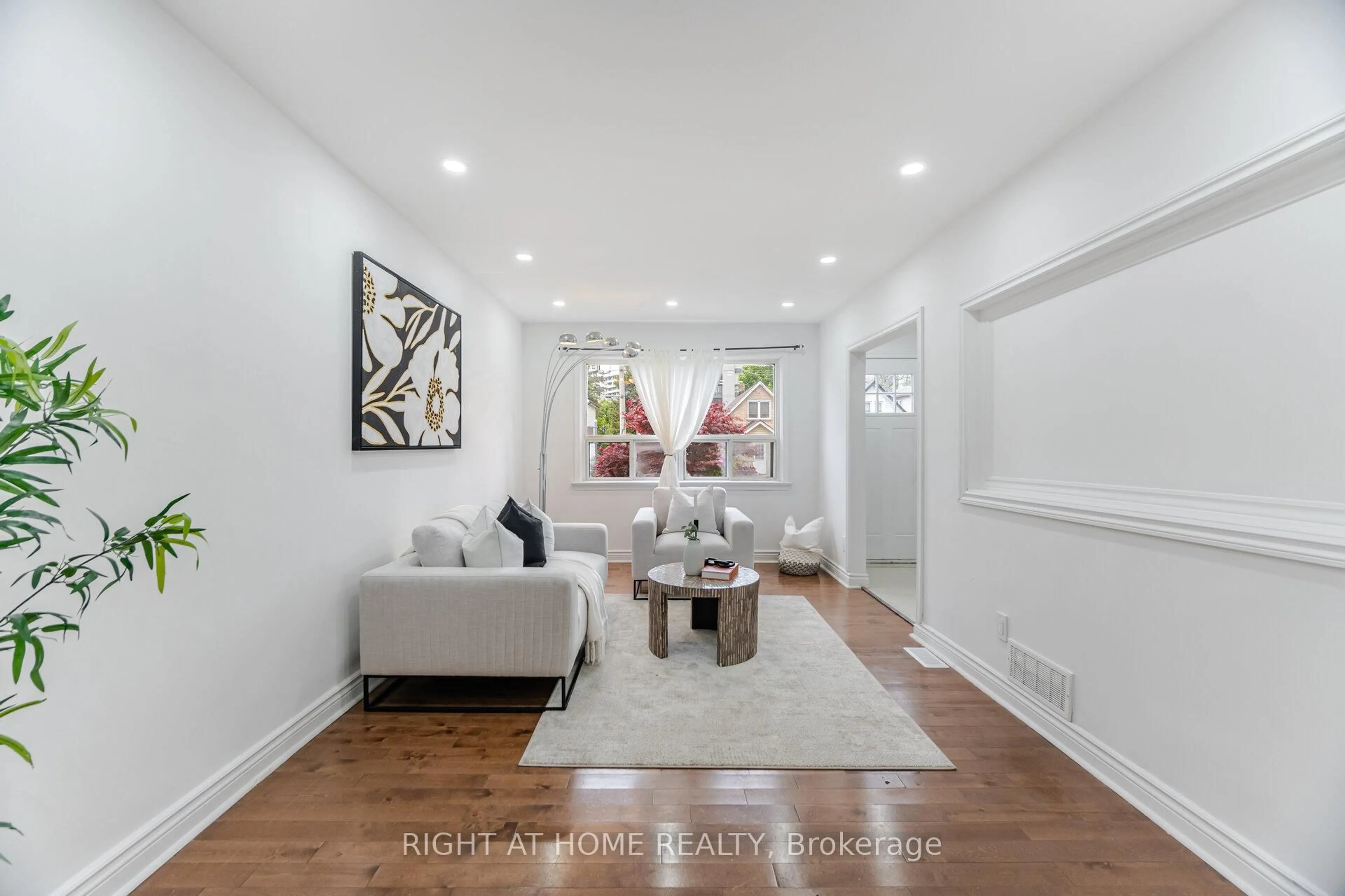 Living room with furniture, unknown for 79 Chapman Ave, Toronto Ontario M4B 1C6