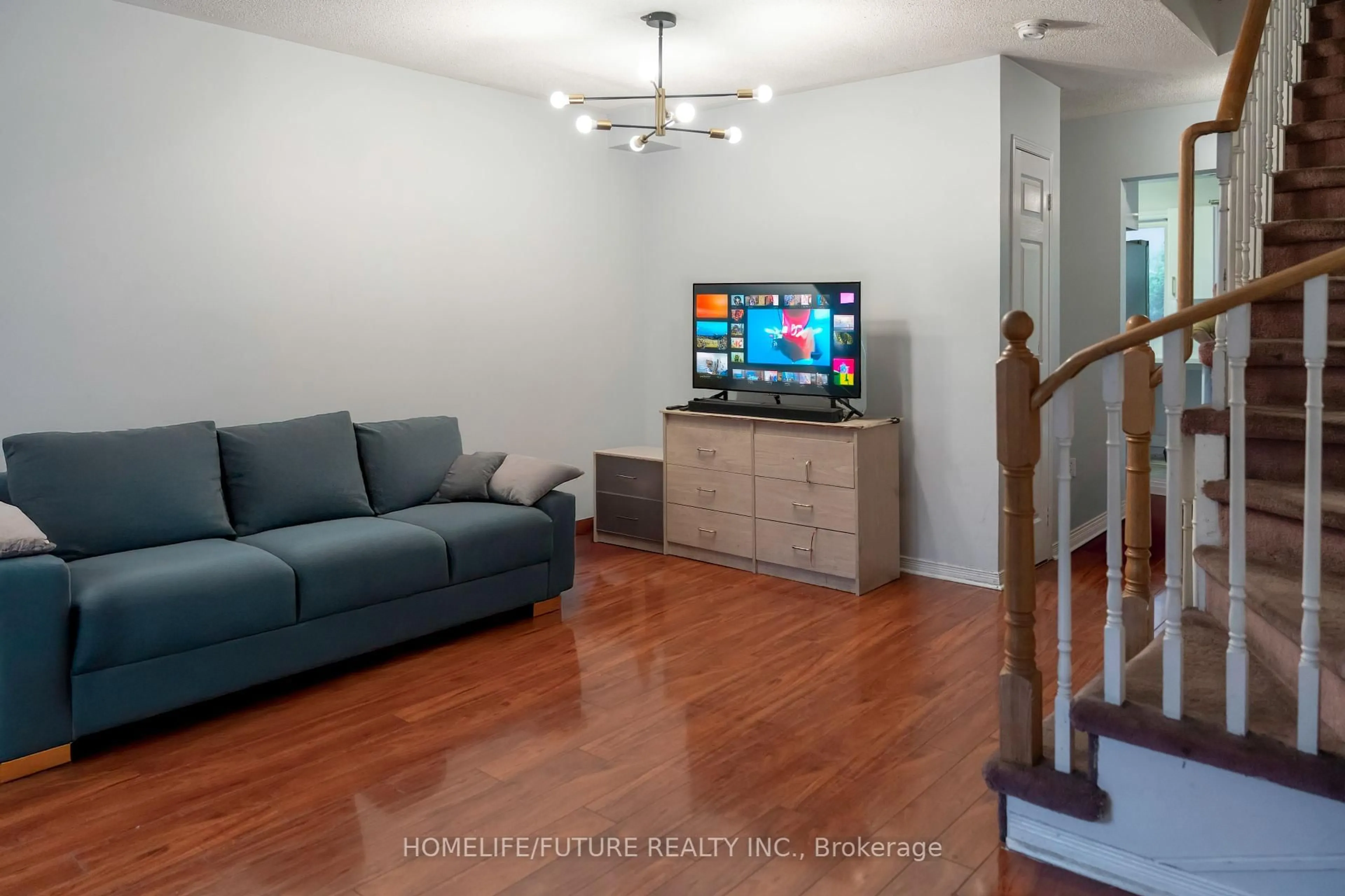 Living room with furniture, unknown for 19 Rosebank Dr #106, Toronto Ontario M1B 5Z2