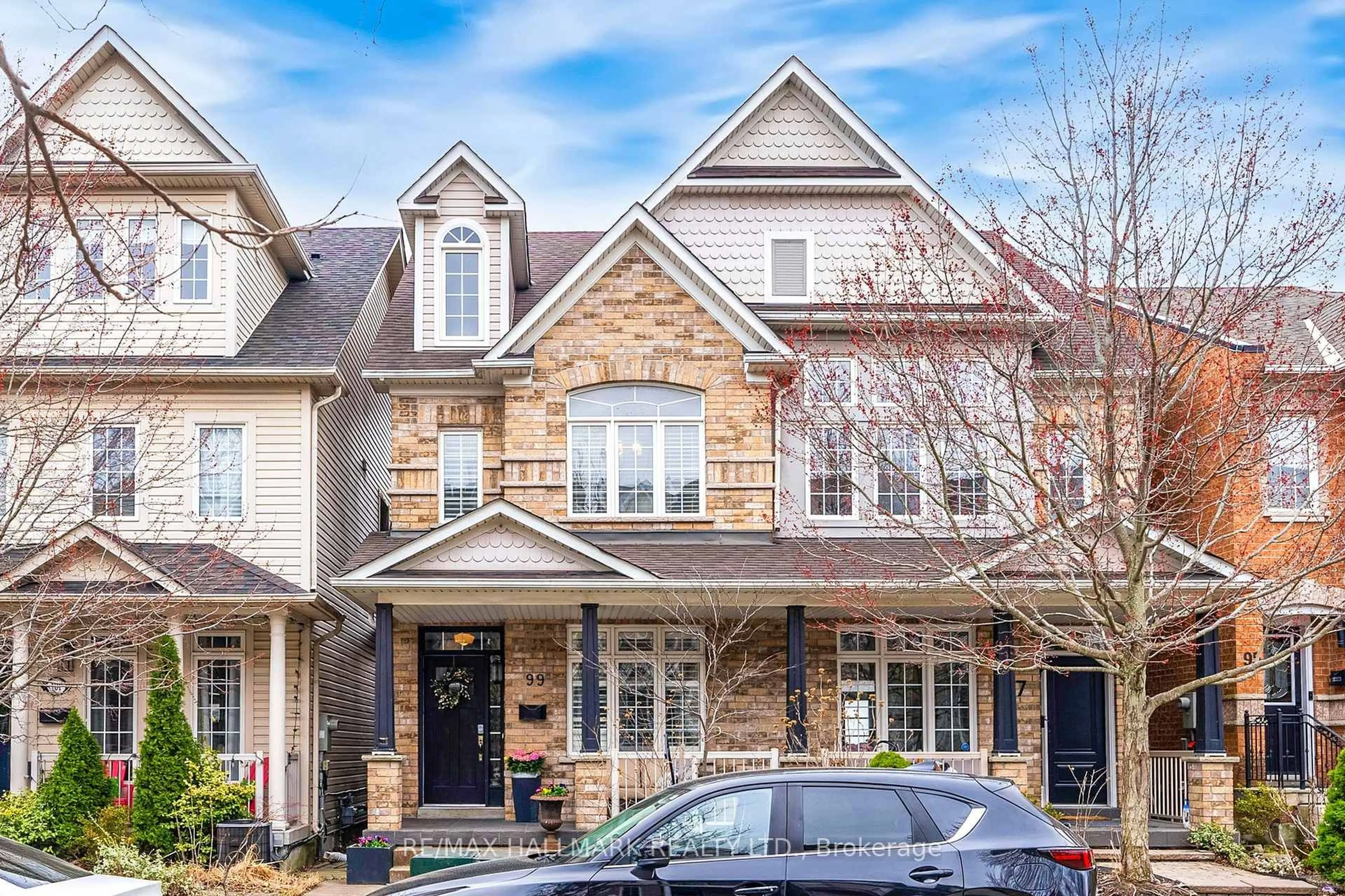 Home with brick exterior material, street for 99 Crossovers St, Toronto Ontario M4E 3X3