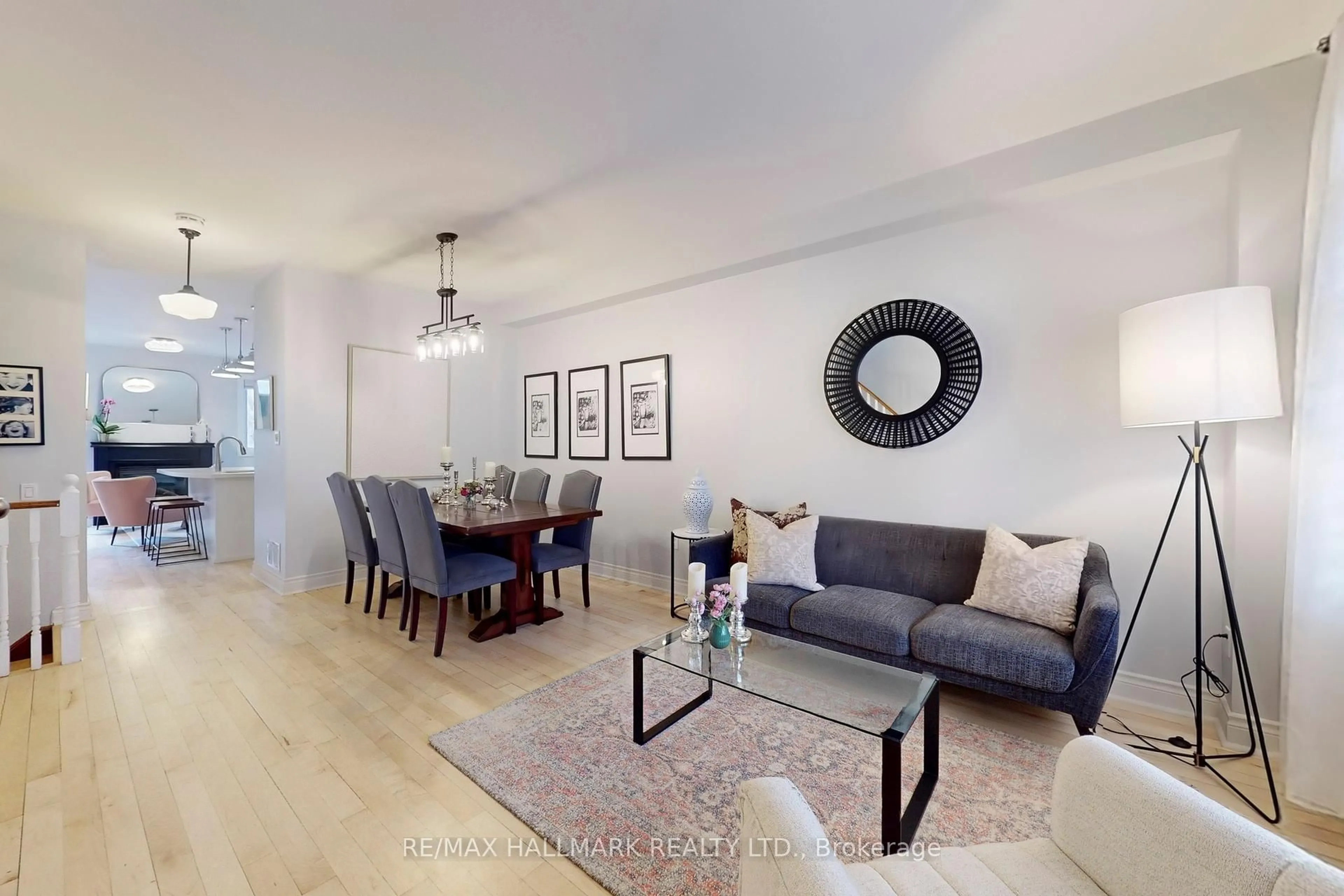 Living room with furniture, wood/laminate floor for 99 Crossovers St, Toronto Ontario M4E 3X3